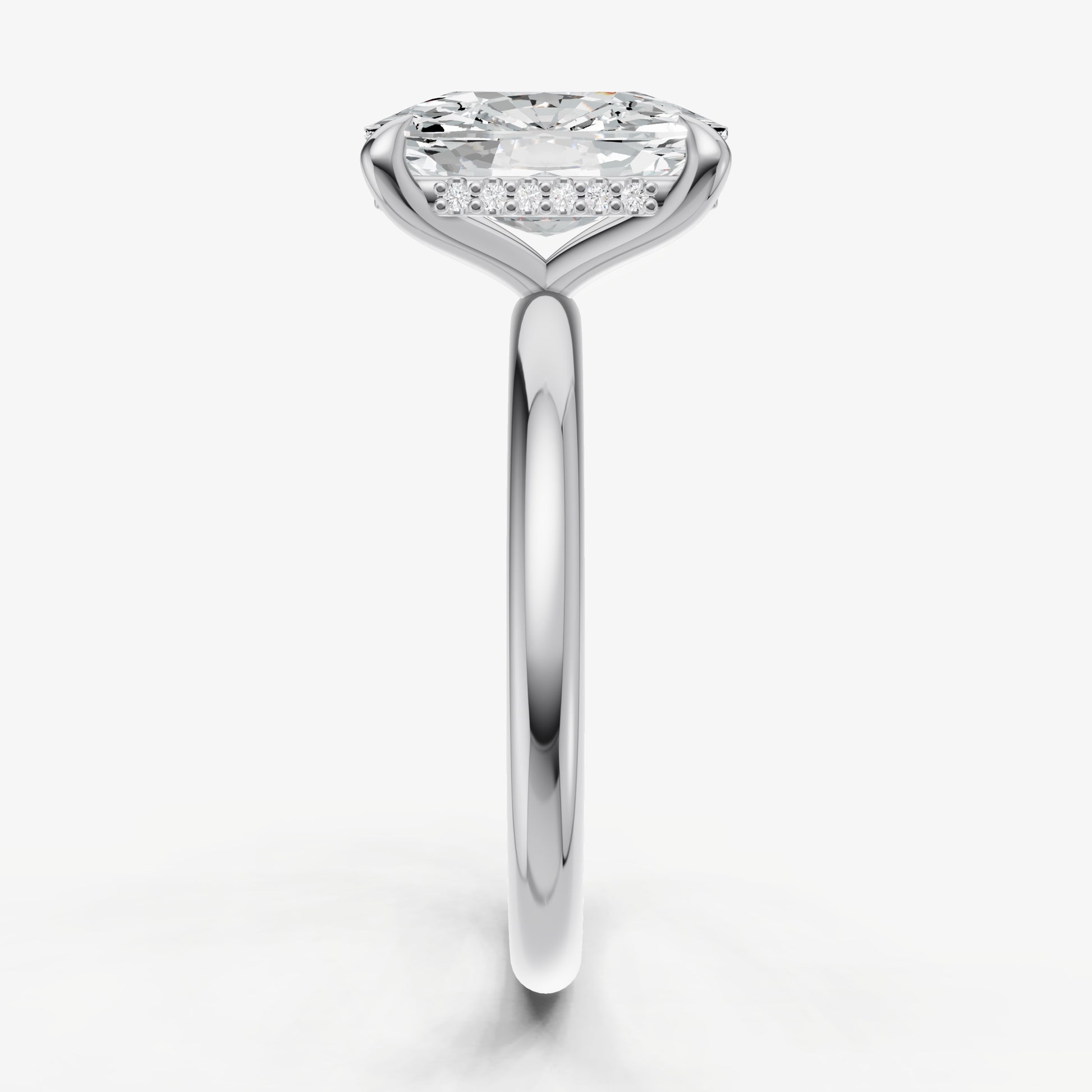 Elongated Cushion Four Claw Solitaire Engagement Ring with Hidden Halo