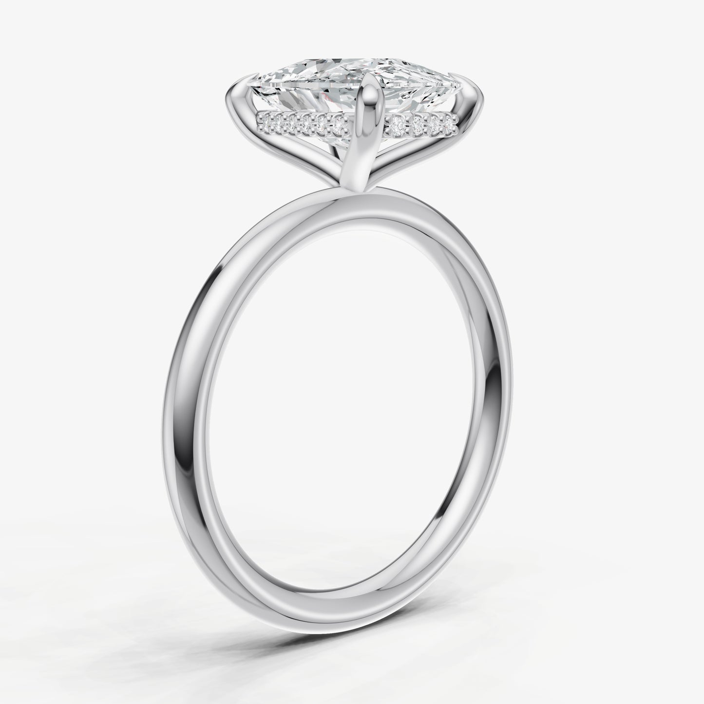Elongated Cushion Four Claw Solitaire Engagement Ring with Hidden Halo