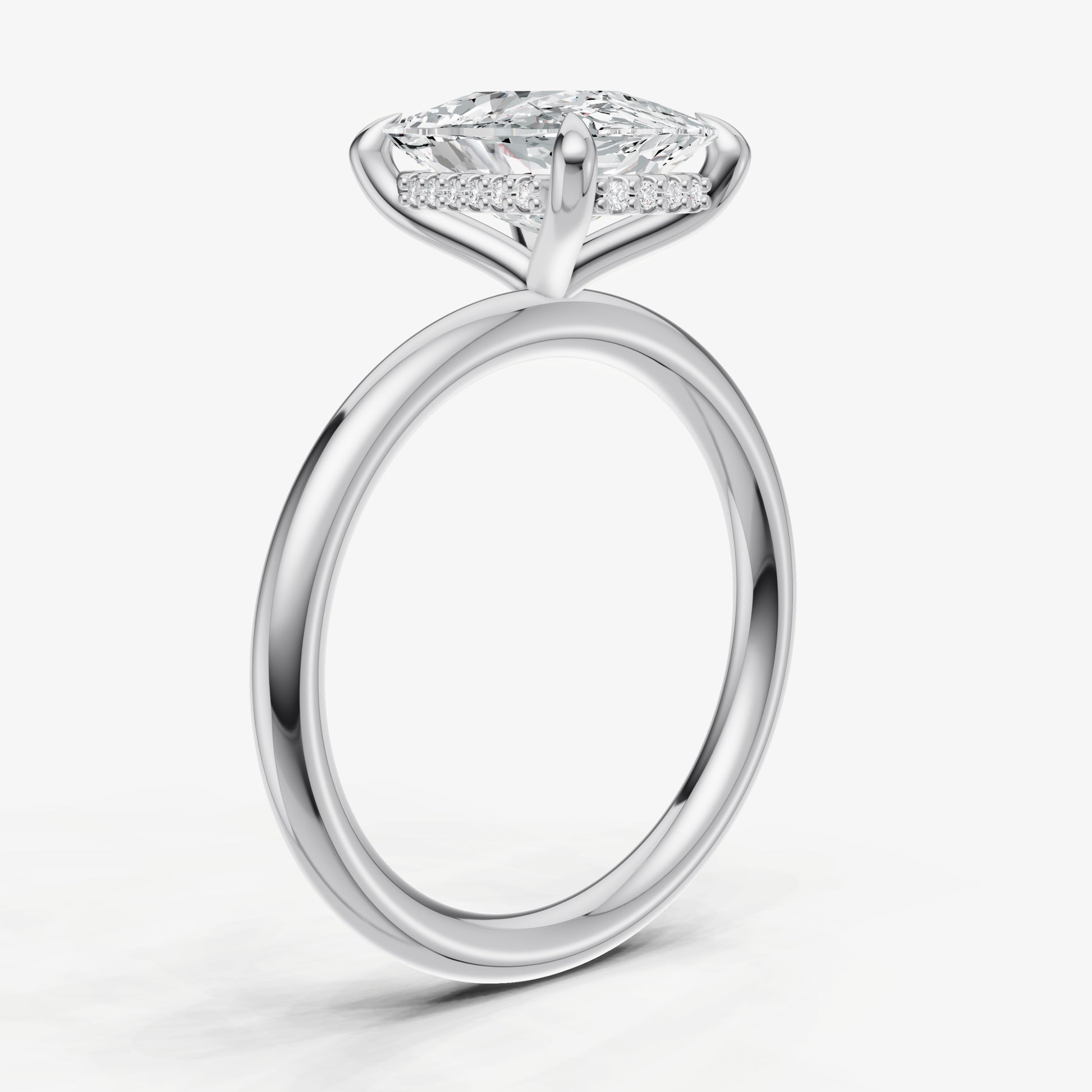 Elongated Cushion Four Claw Solitaire Engagement Ring with Hidden Halo
