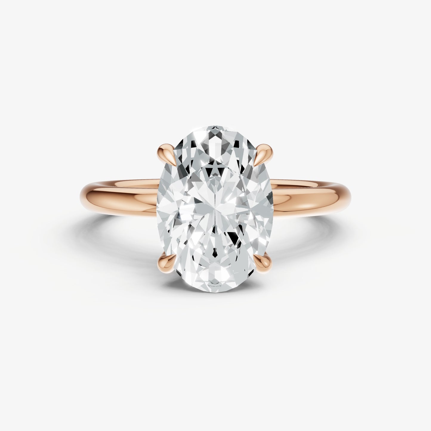 Oval Four Claw Solitaire Engagement Ring with Hidden Halo