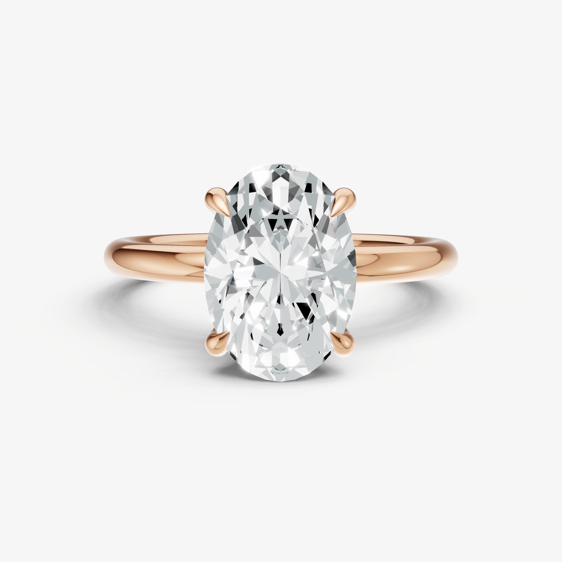 Oval Four Claw Solitaire Engagement Ring with Hidden Halo