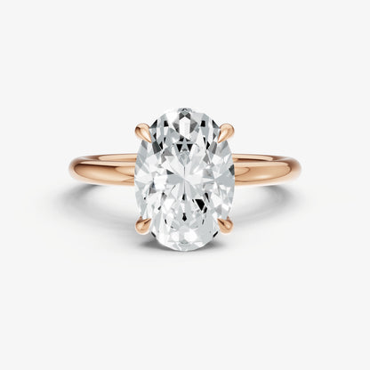 Oval Four Claw Solitaire Engagement Ring with Hidden Halo