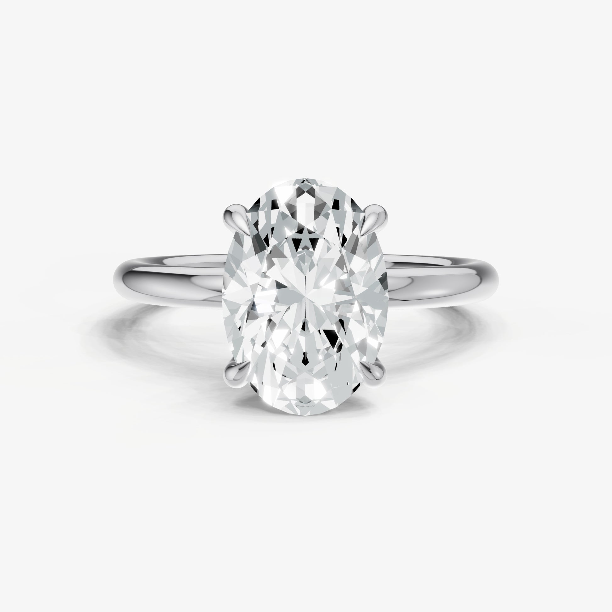 Oval Four Claw Solitaire Engagement Ring with Hidden Halo