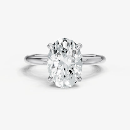 Oval Four Claw Solitaire Engagement Ring with Hidden Halo