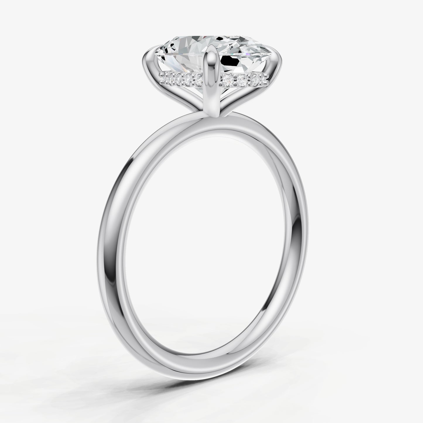 Oval Four Claw Solitaire Engagement Ring with Hidden Halo