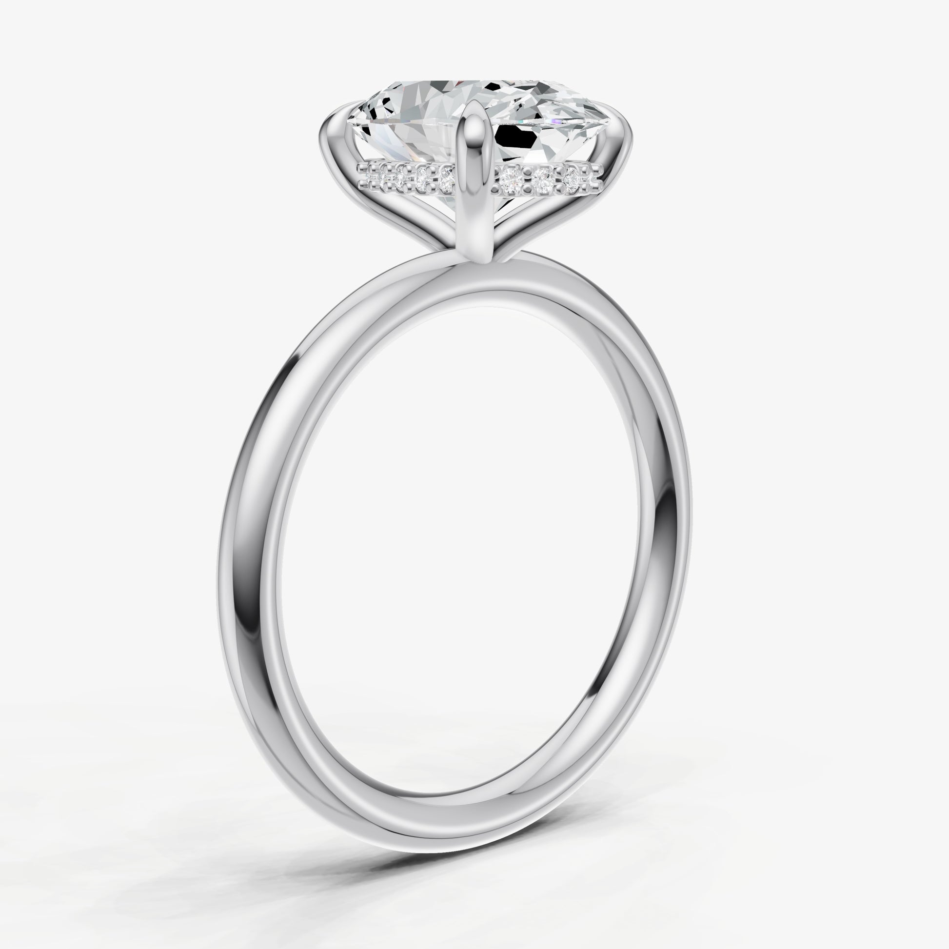 Oval Four Claw Solitaire Engagement Ring with Hidden Halo