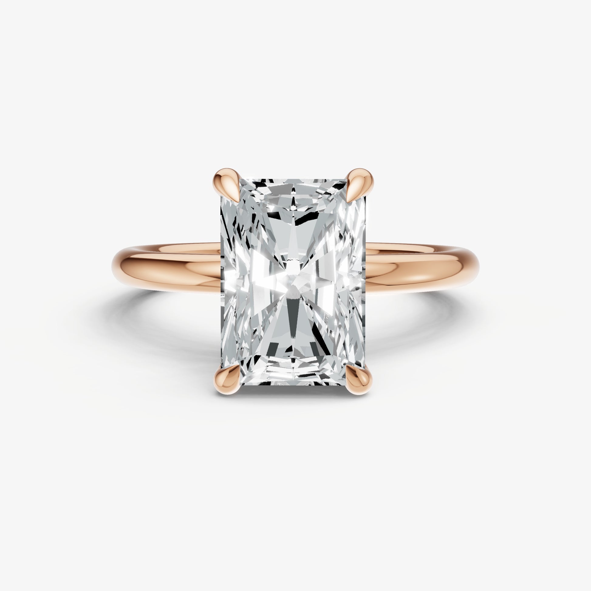 Radiant Four Claw Solitaire Engagement Ring with Hidden Halo