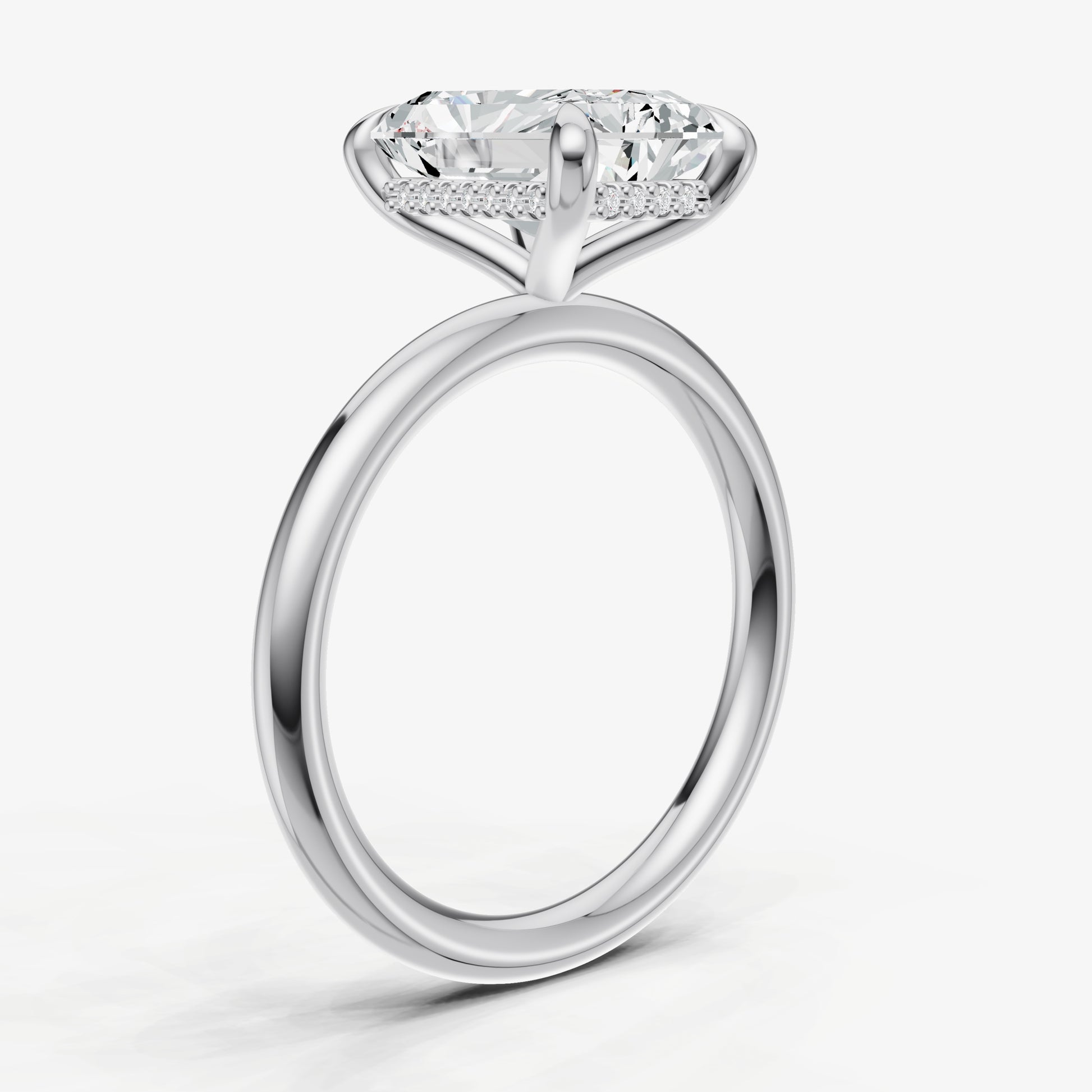 Radiant Four Claw Solitaire Engagement Ring with Hidden Halo