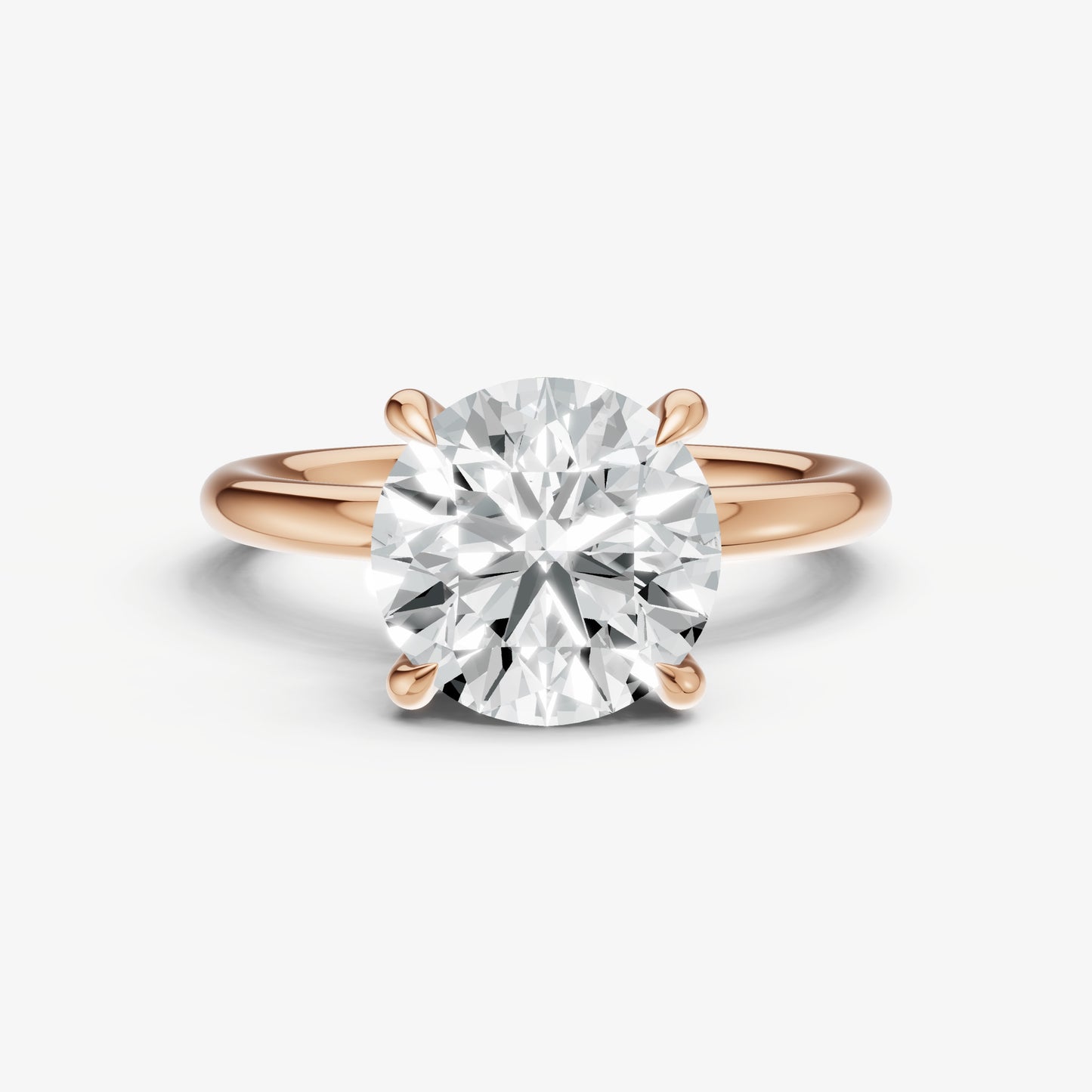 Round Four Claw Solitaire Engagement Ring with Hidden Halo