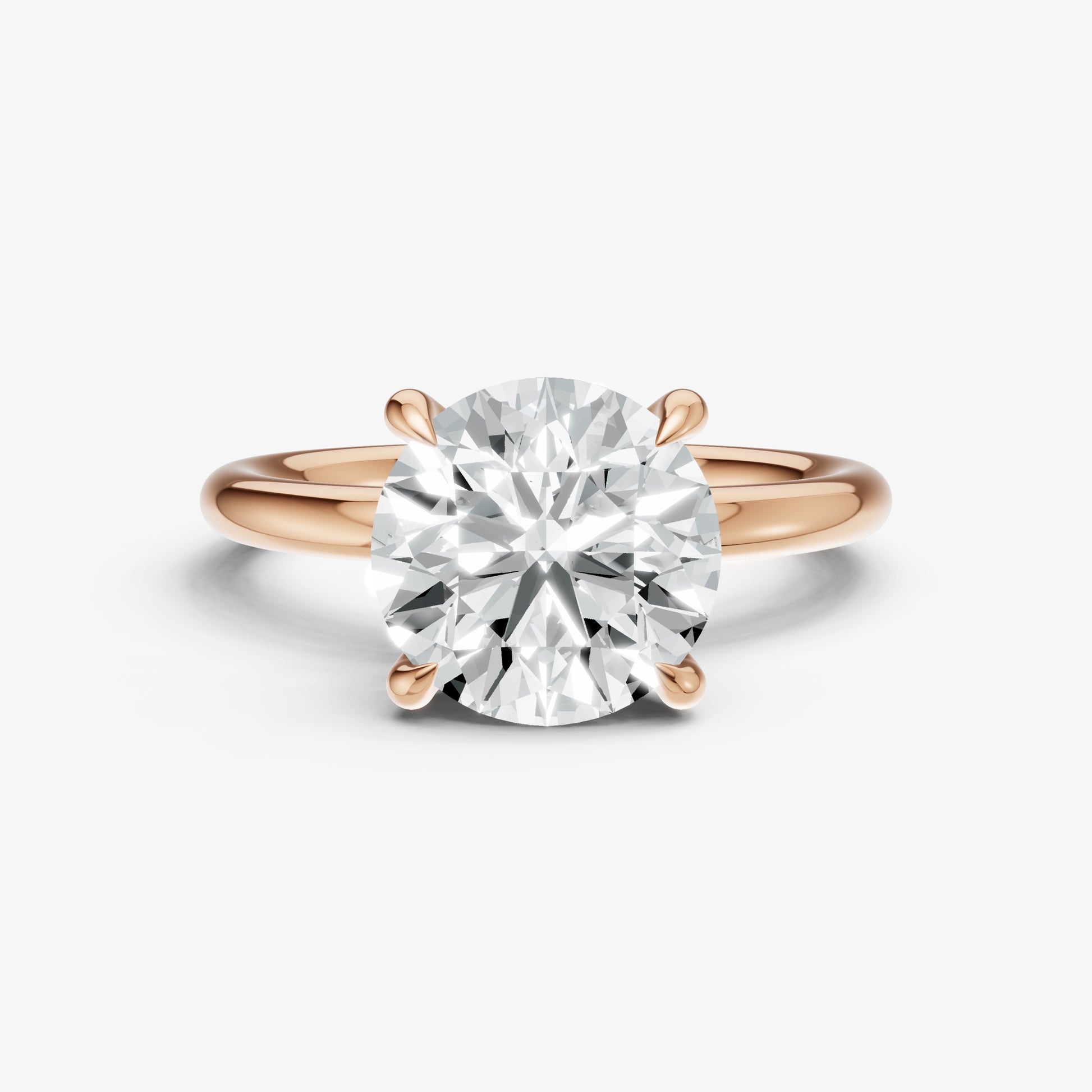 Round Four Claw Solitaire Engagement Ring with Hidden Halo