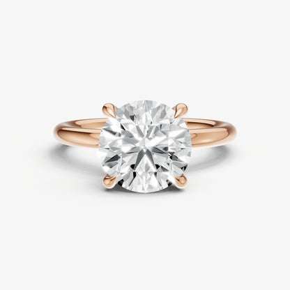 Round Four Claw Solitaire Engagement Ring with Hidden Halo