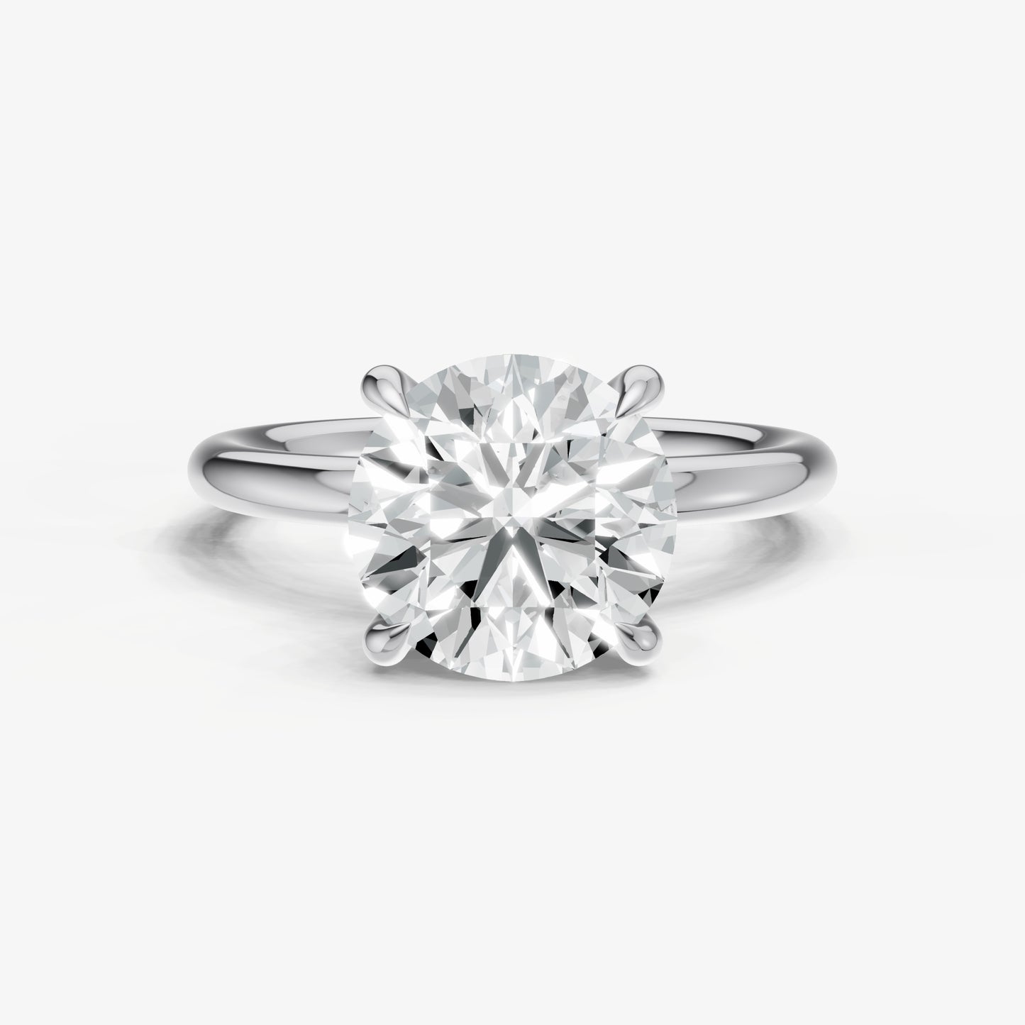 Round Four Claw Solitaire Engagement Ring with Hidden Halo