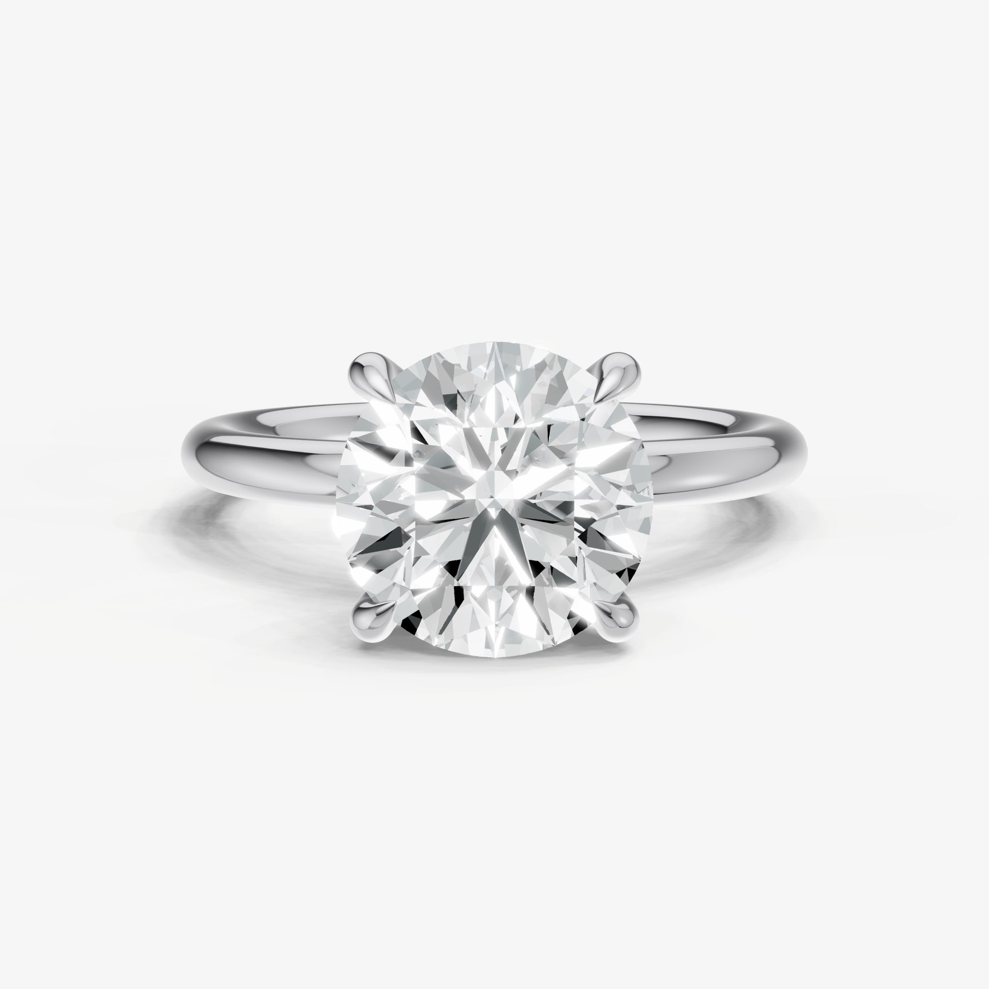 Round Four Claw Solitaire Engagement Ring with Hidden Halo