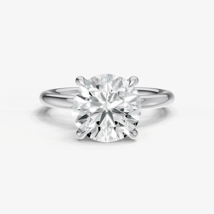 Round Four Claw Solitaire Engagement Ring with Hidden Halo