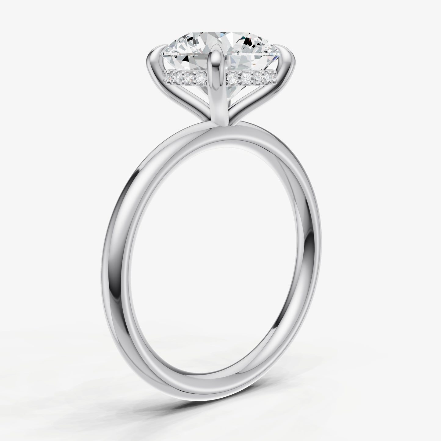 Round Four Claw Solitaire Engagement Ring with Hidden Halo