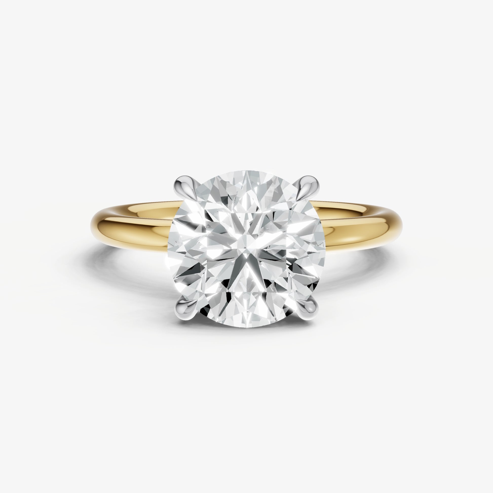 Round Four Claw Solitaire Engagement Ring with Hidden Halo