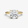 Round Four Claw Solitaire Engagement Ring with Hidden Halo