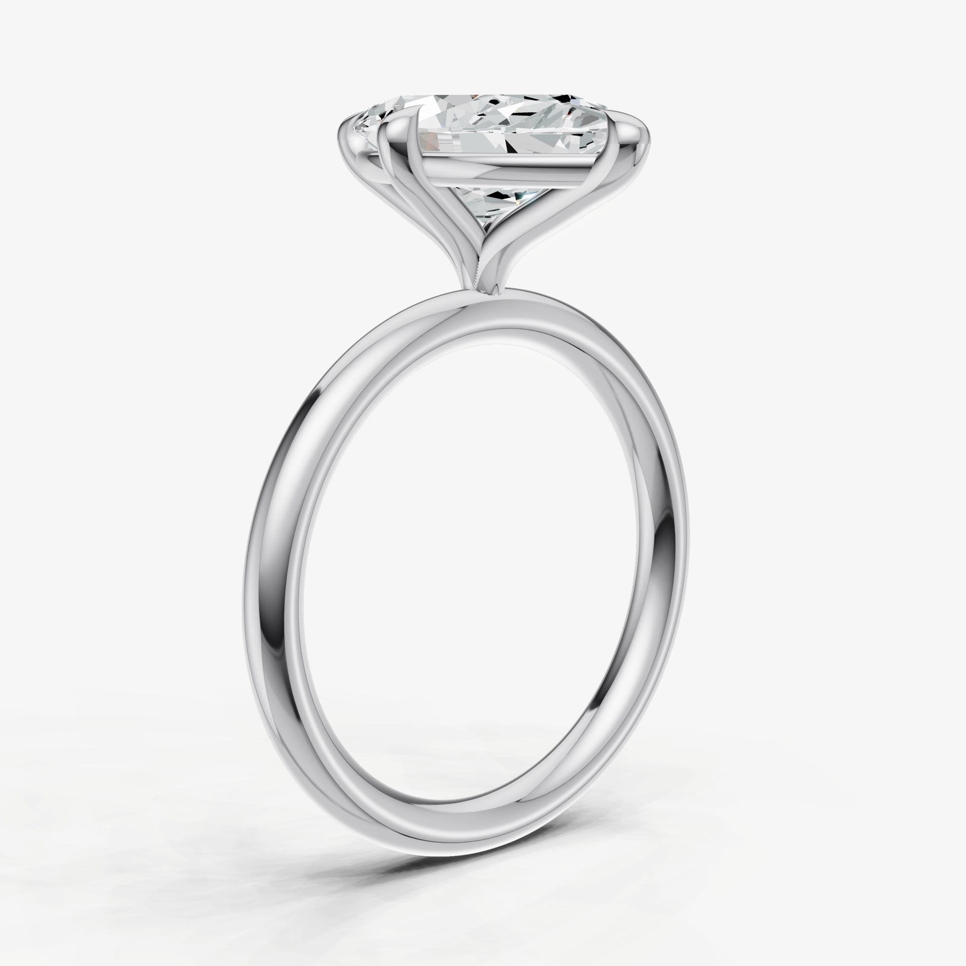 Marquise Compassss Claw Solitaire