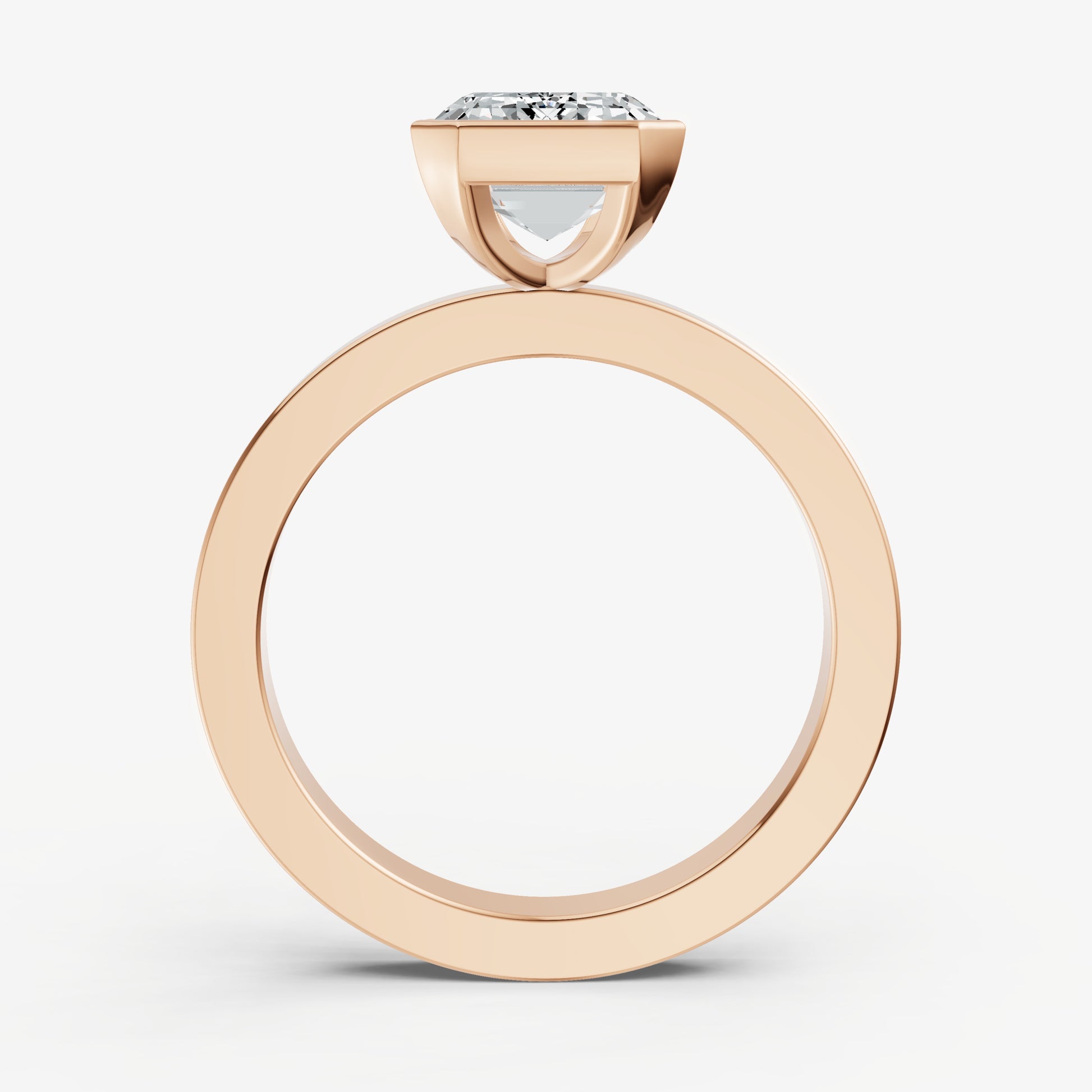 Emerald Bezel Set Solitaire Engagement Ring