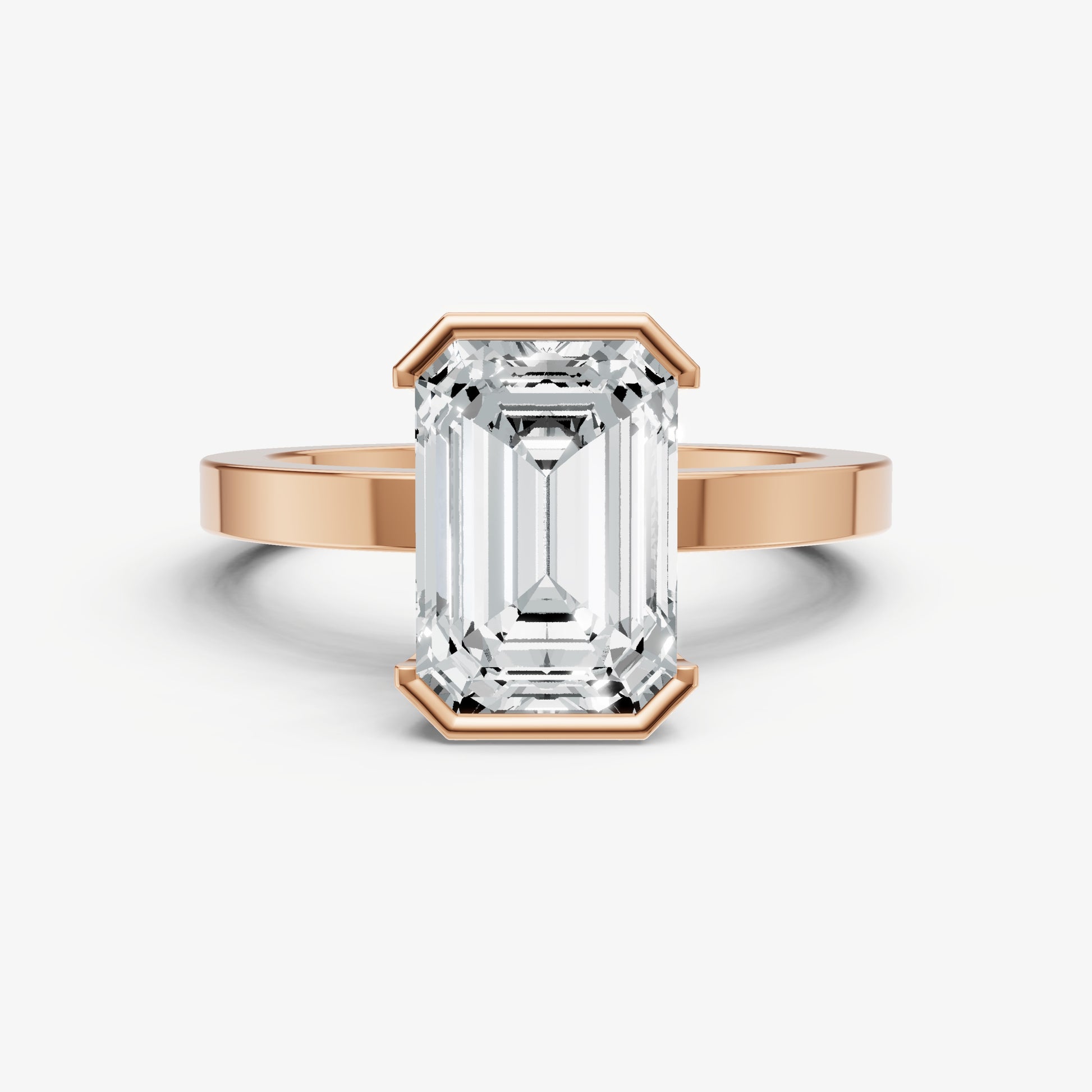 Emerald Bezel Set Solitaire Engagement Ring