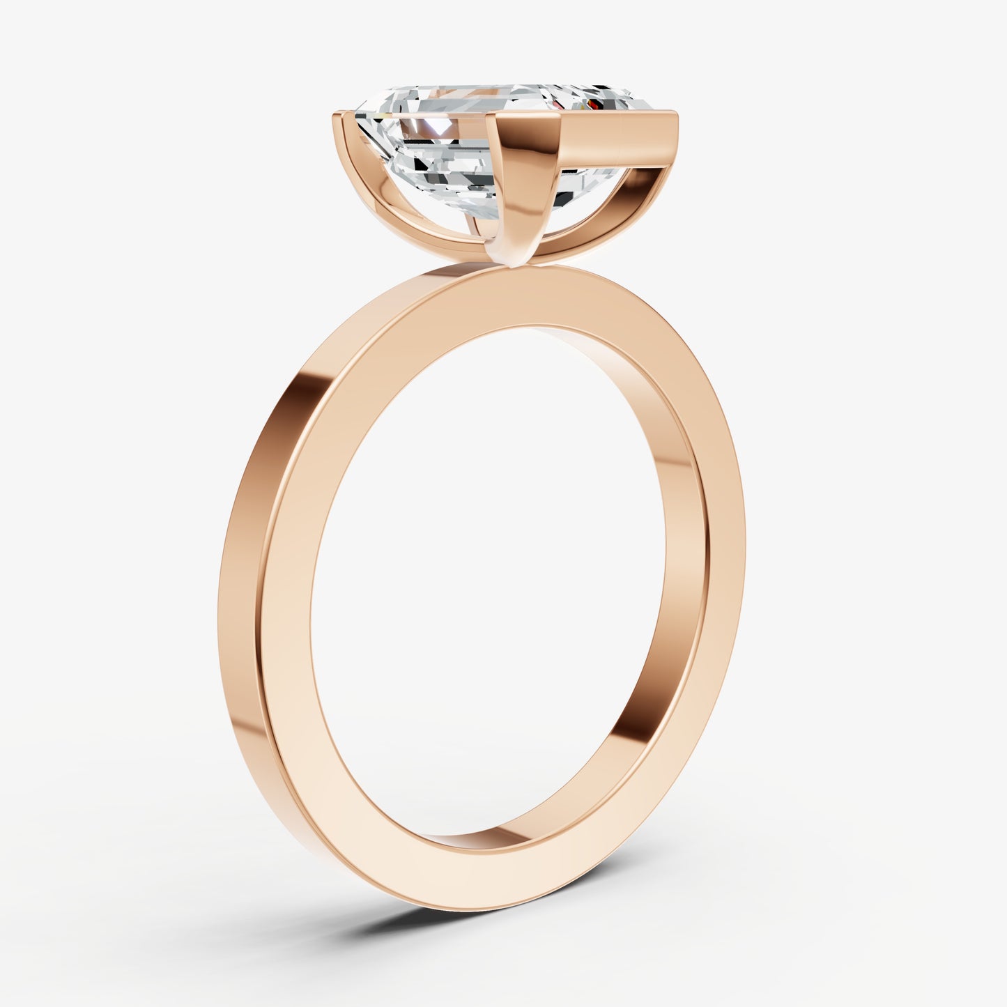 Emerald Bezel Set Solitaire Engagement Ring