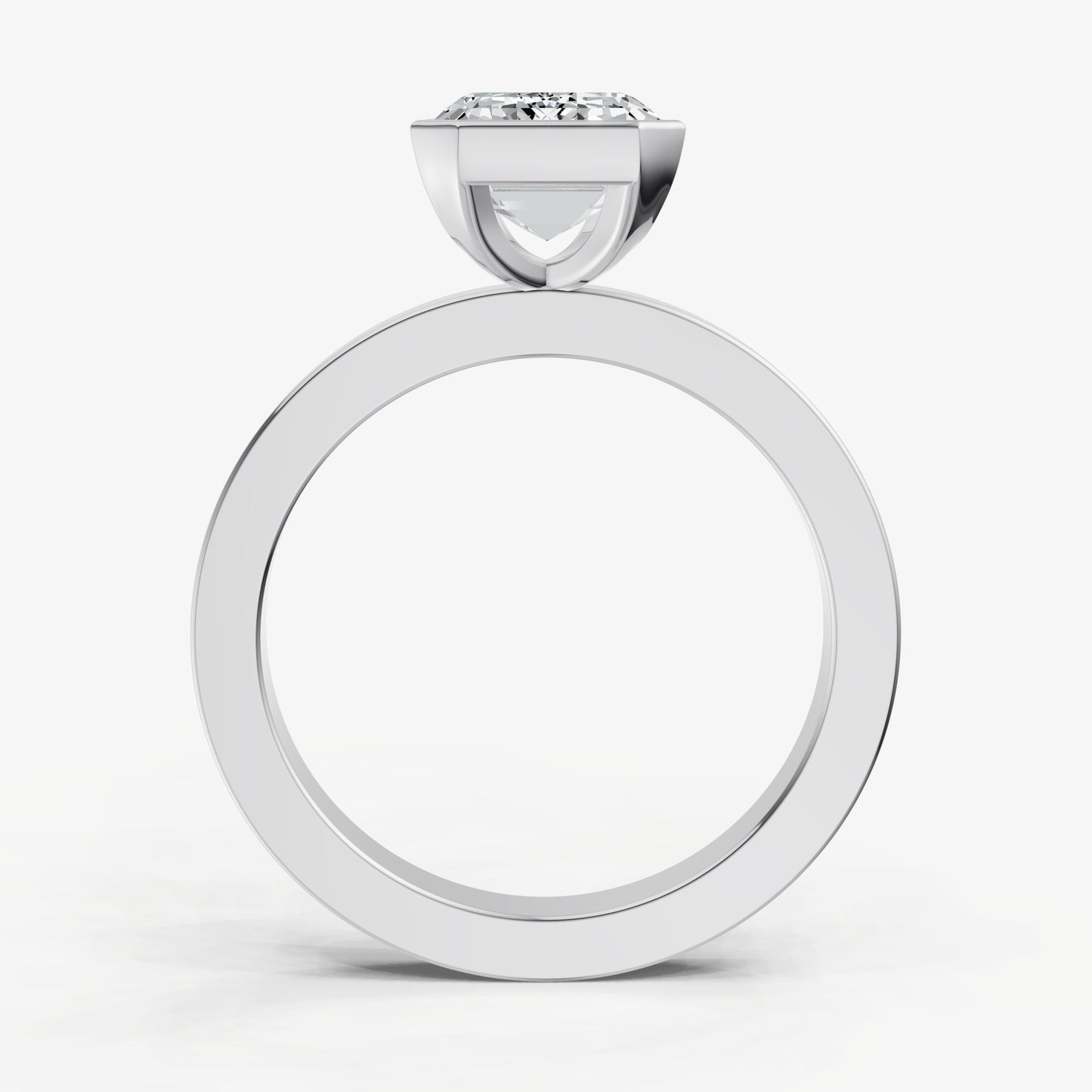 Emerald Bezel Set Solitaire Engagement Ring