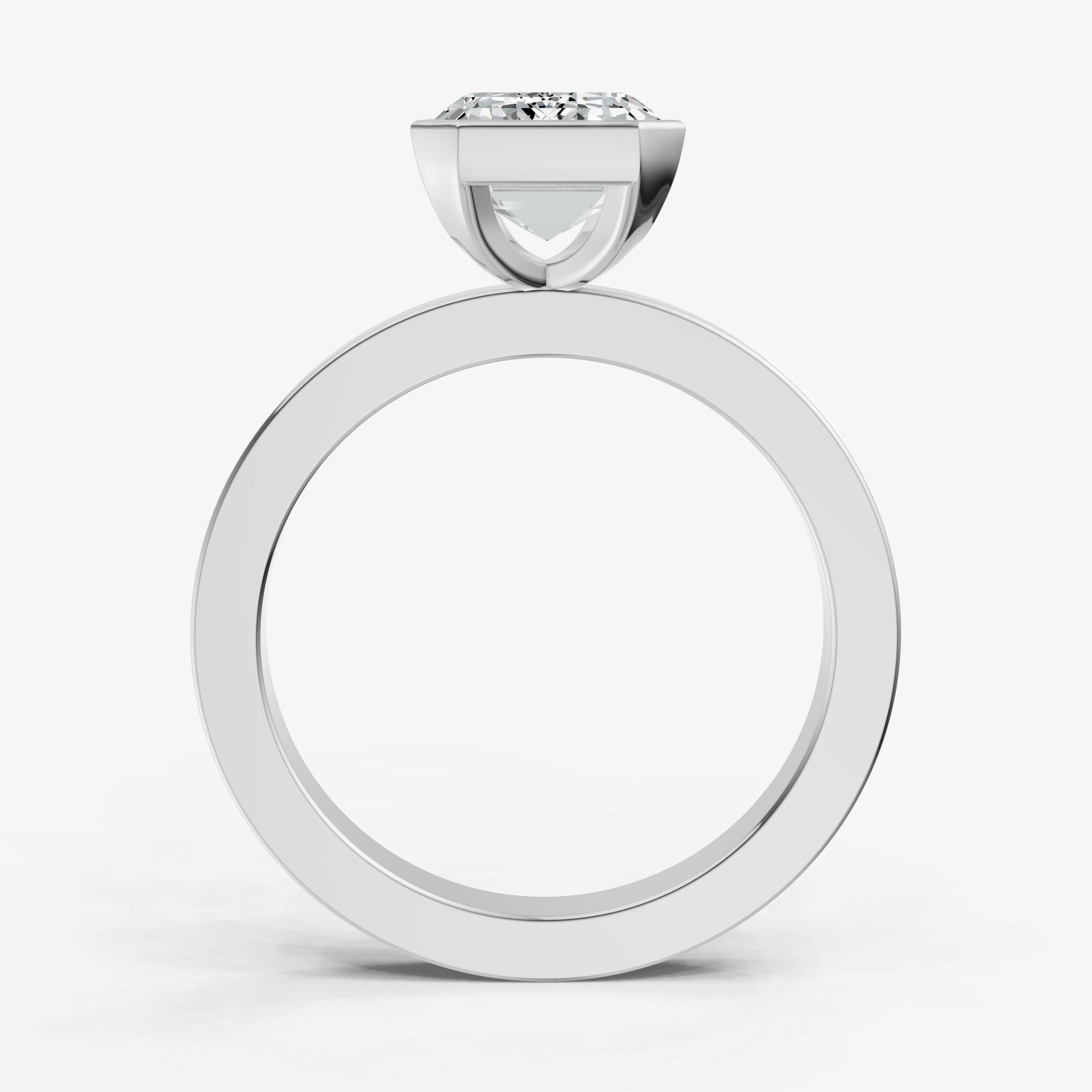 Emerald Bezel Set Solitaire Engagement Ring