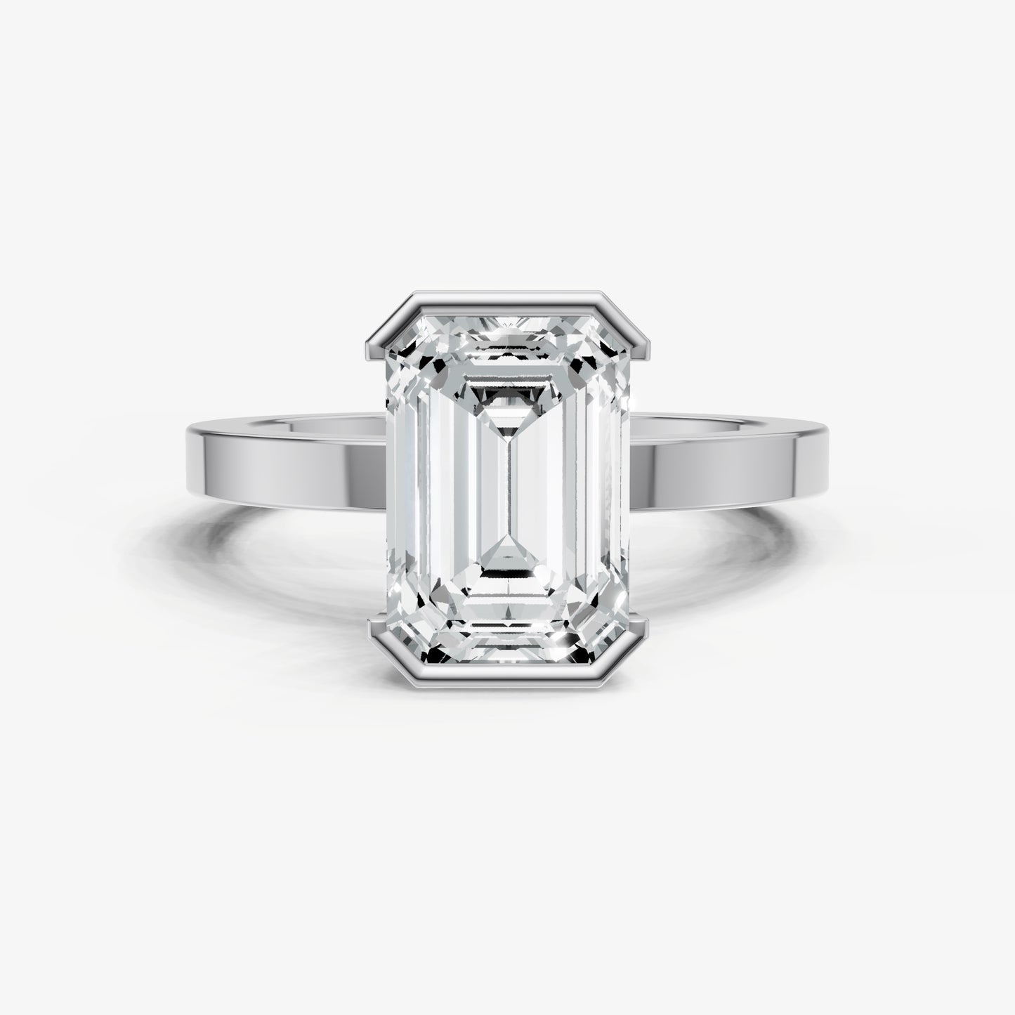 Emerald Bezel Set Solitaire Engagement Ring