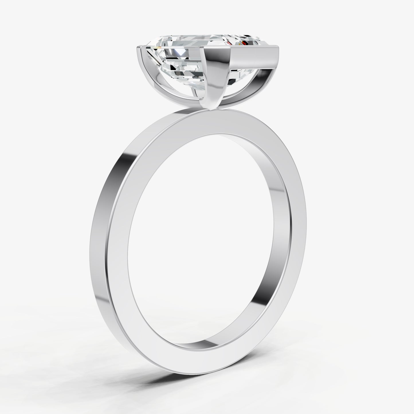 Emerald Bezel Set Solitaire Engagement Ring