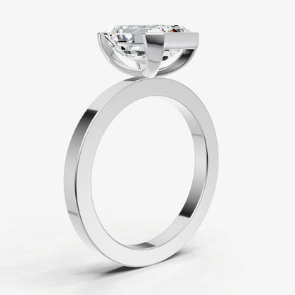 Emerald Bezel Set Solitaire Engagement Ring