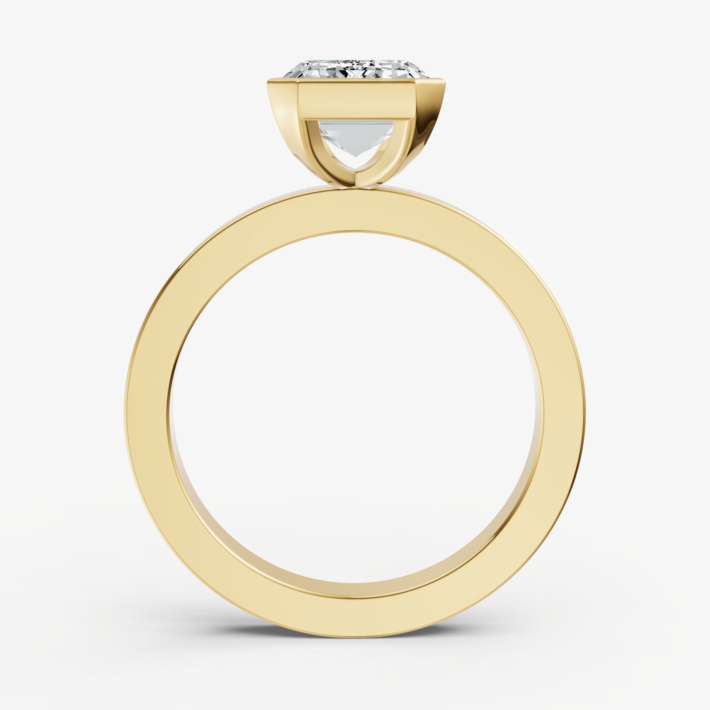 Emerald Bezel Set Solitaire Engagement Ring