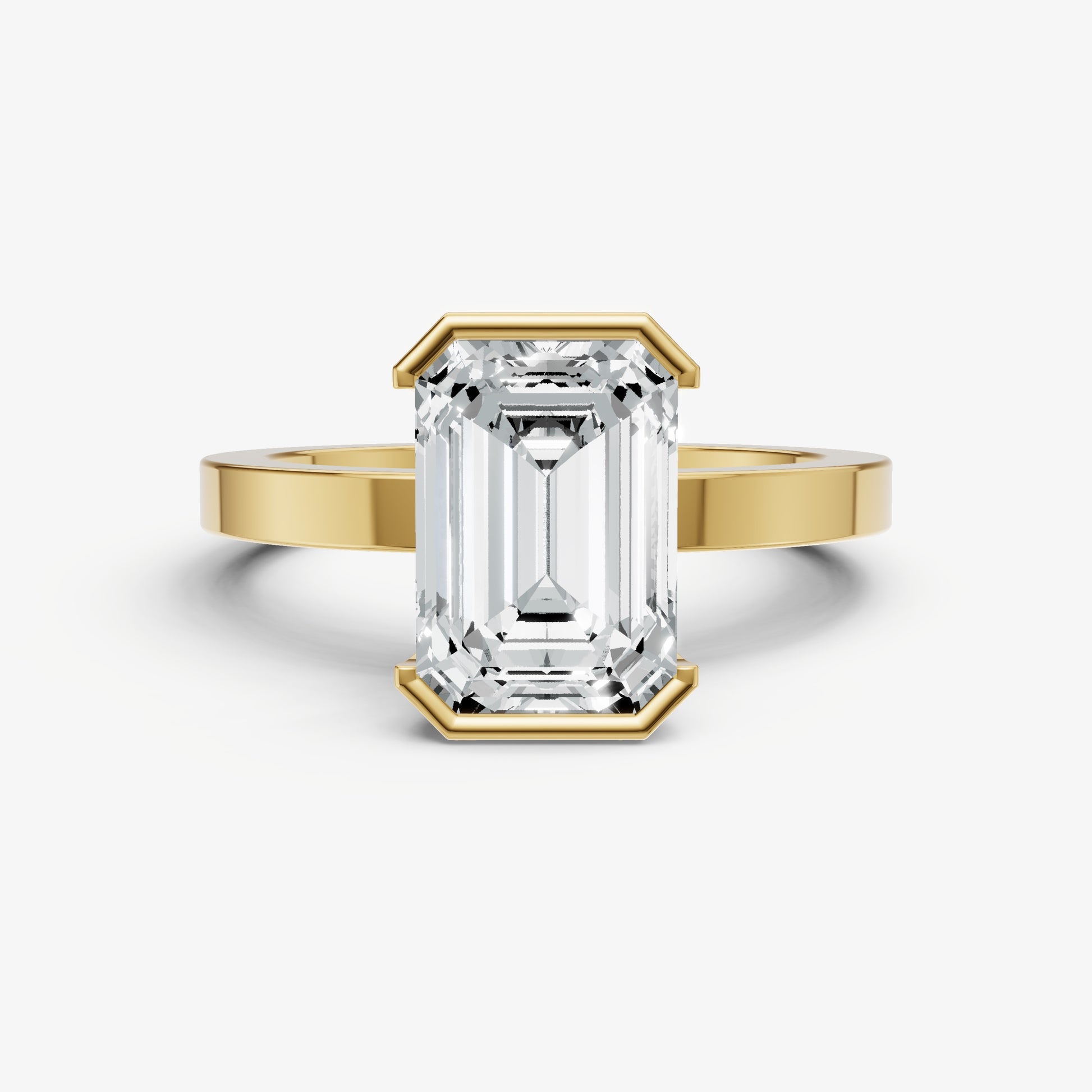 Emerald Bezel Set Solitaire Engagement Ring