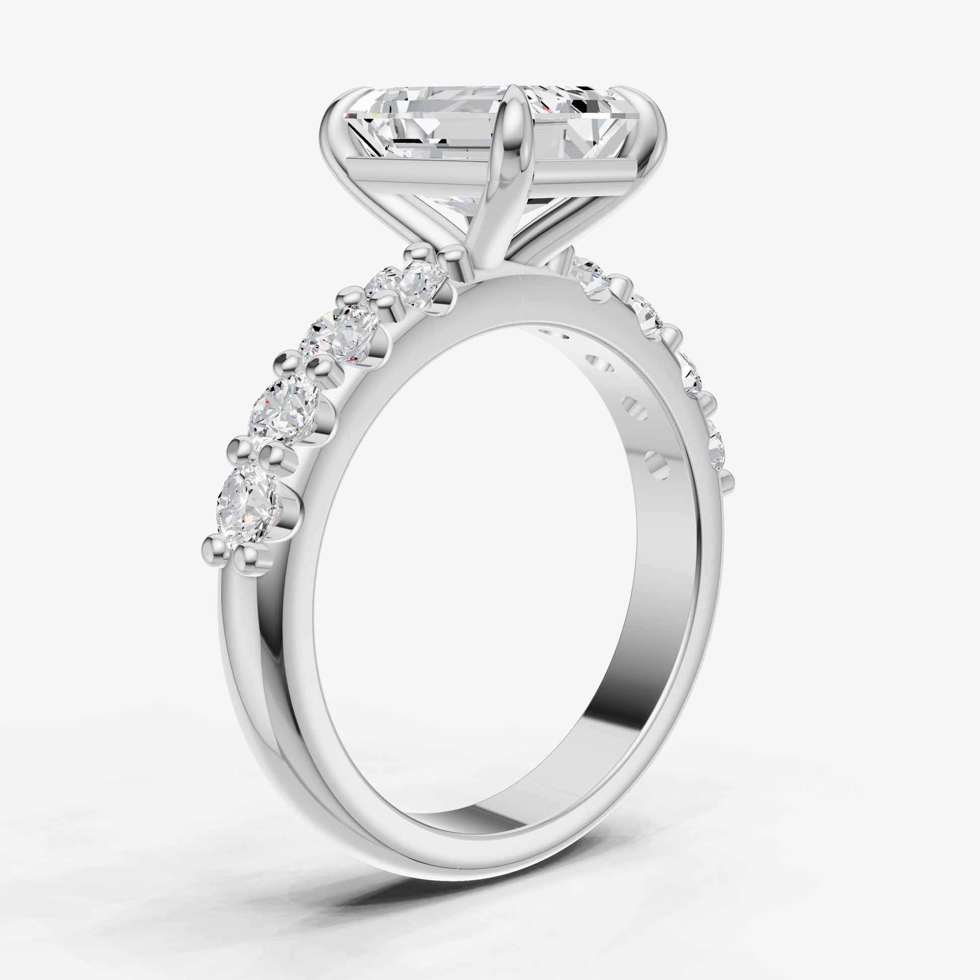 Emerald Solitaire Engagement Ring with Statement Diamond Band