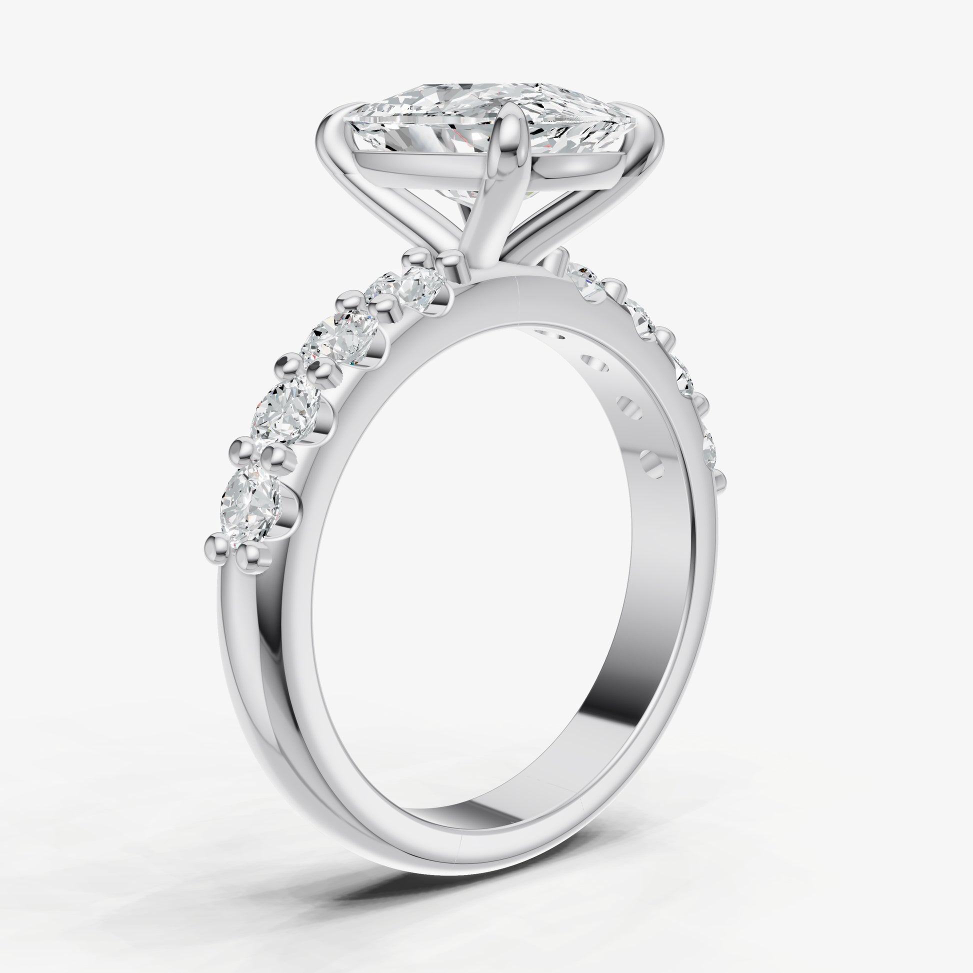 Elongated Cushion Solitaire Engagement Ring with Statement Diamond Band