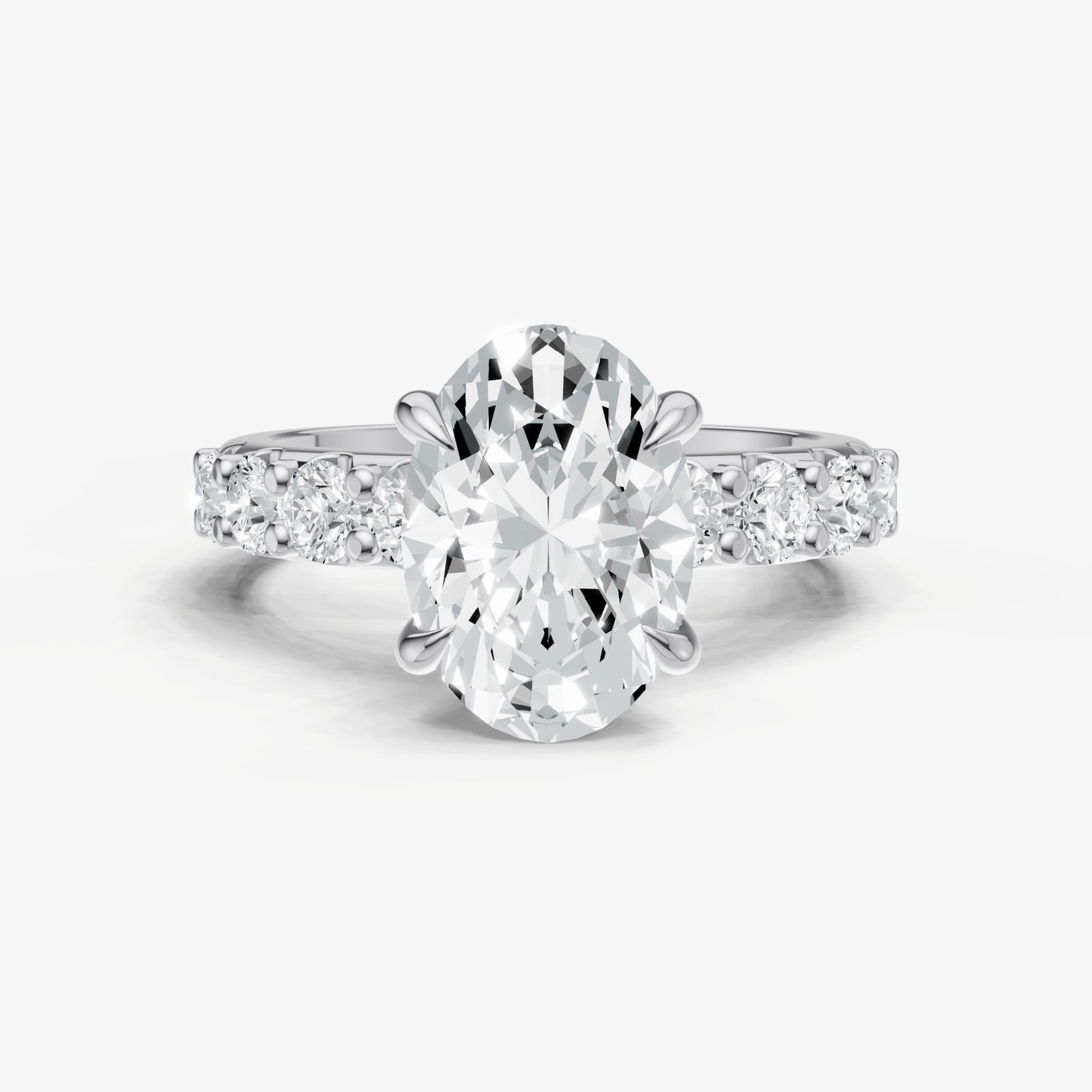 Oval Solitaire Engagement Ring with Statement Diamond Band