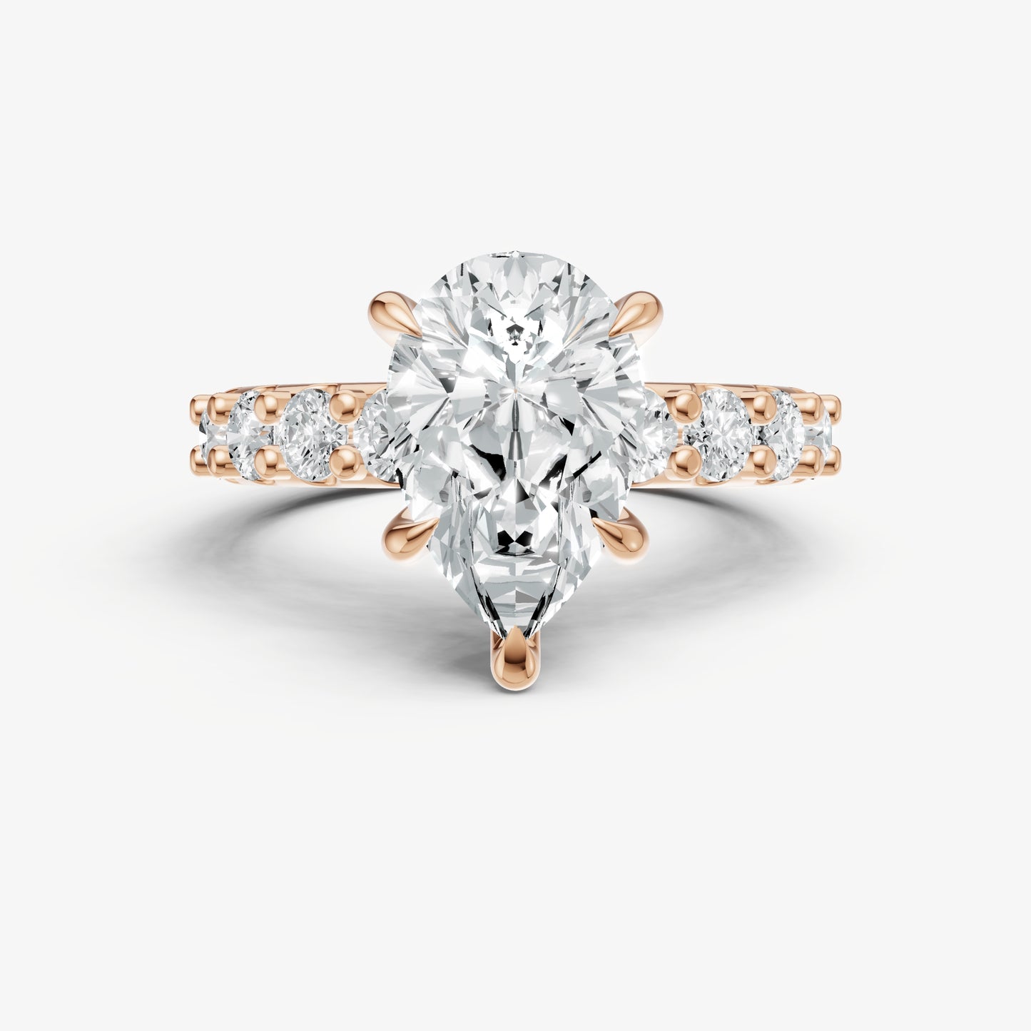 Pear Solitaire Engagement Ring with Statement Diamond Band