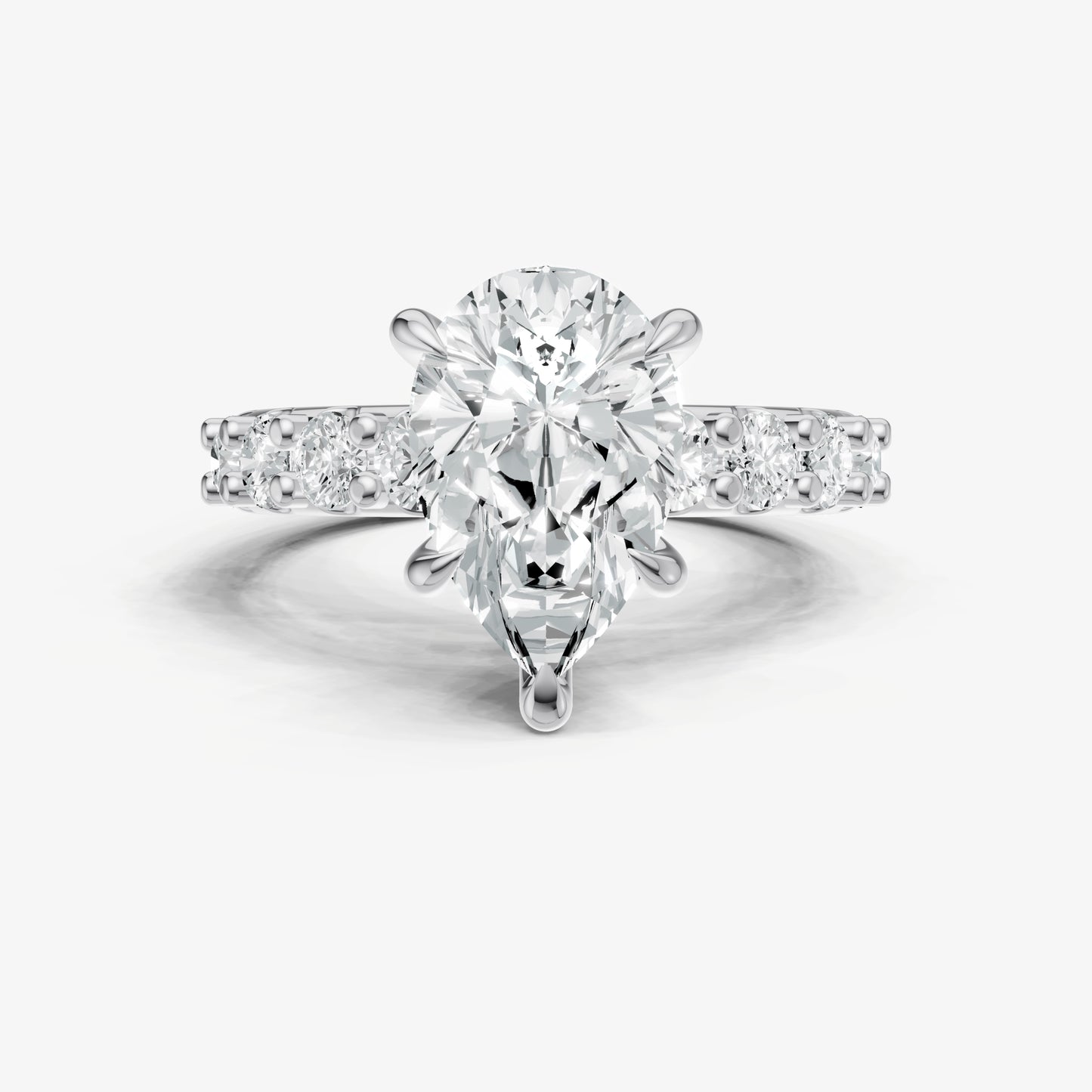 Pear Solitaire Engagement Ring with Statement Diamond Band