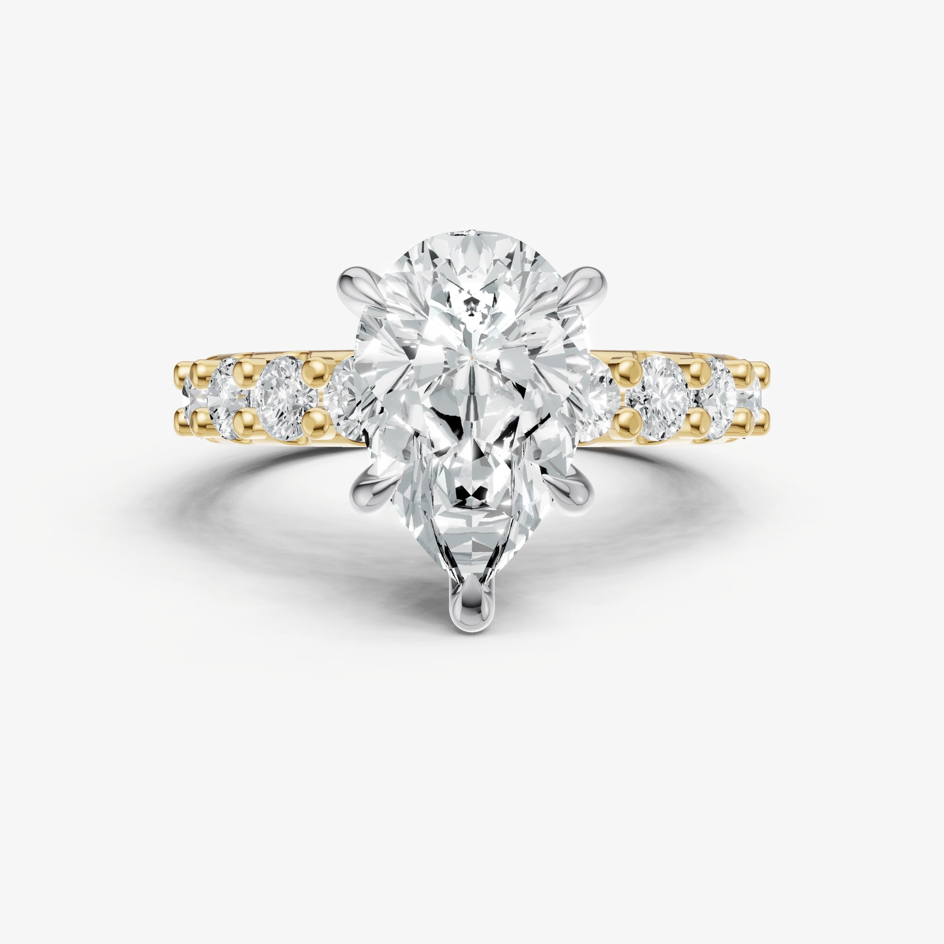 Pear Solitaire Engagement Ring with Statement Diamond Band
