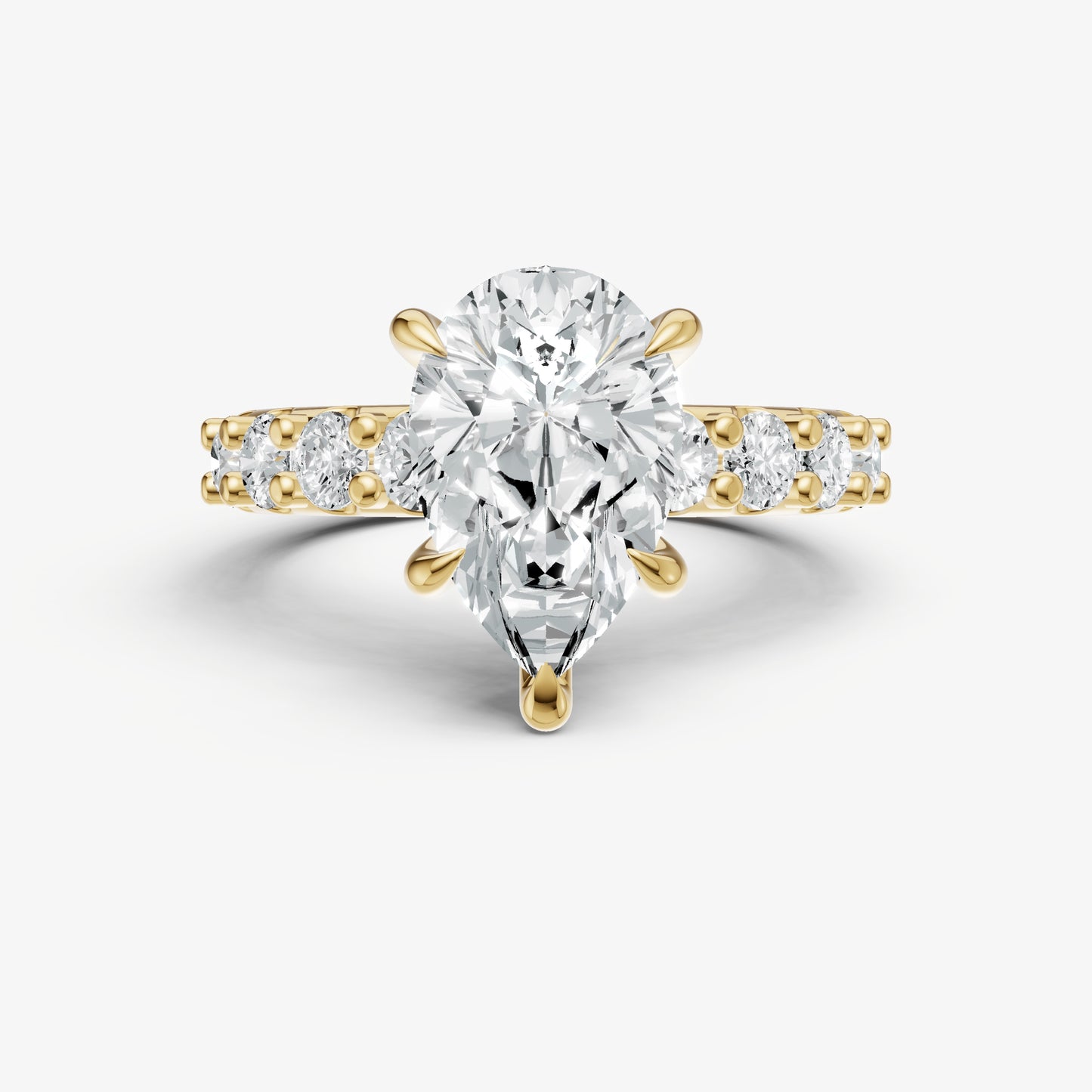Pear Solitaire Engagement Ring with Statement Diamond Band