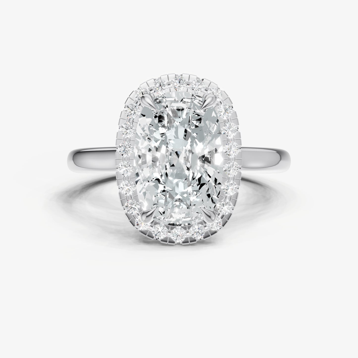 Elongated Cushion Solitaire Engagement Ring with Fine Halo Diamond Band