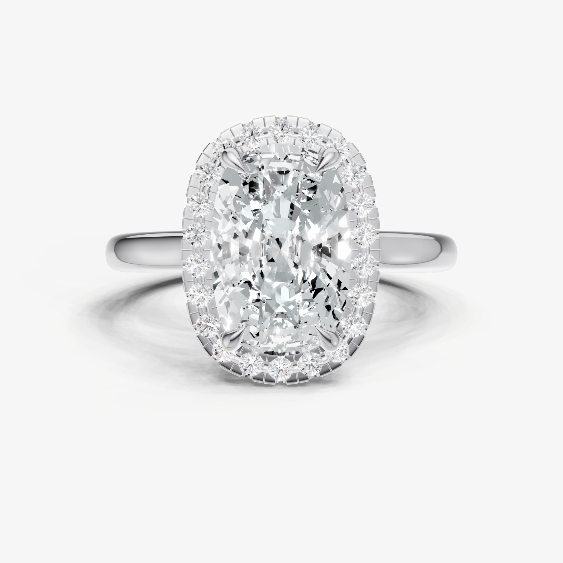 Elongated Cushion Solitaire Engagement Ring with Fine Halo Diamond Band