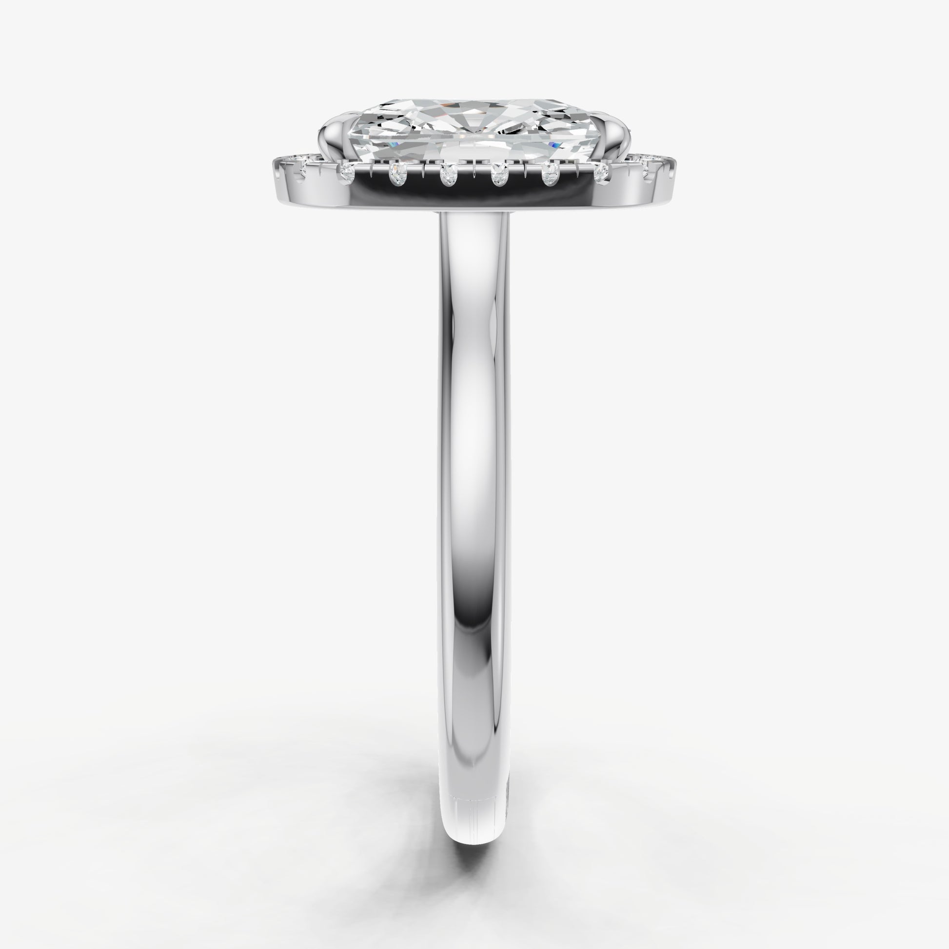 Elongated Cushion Solitaire Engagement Ring with Fine Halo Diamond Band