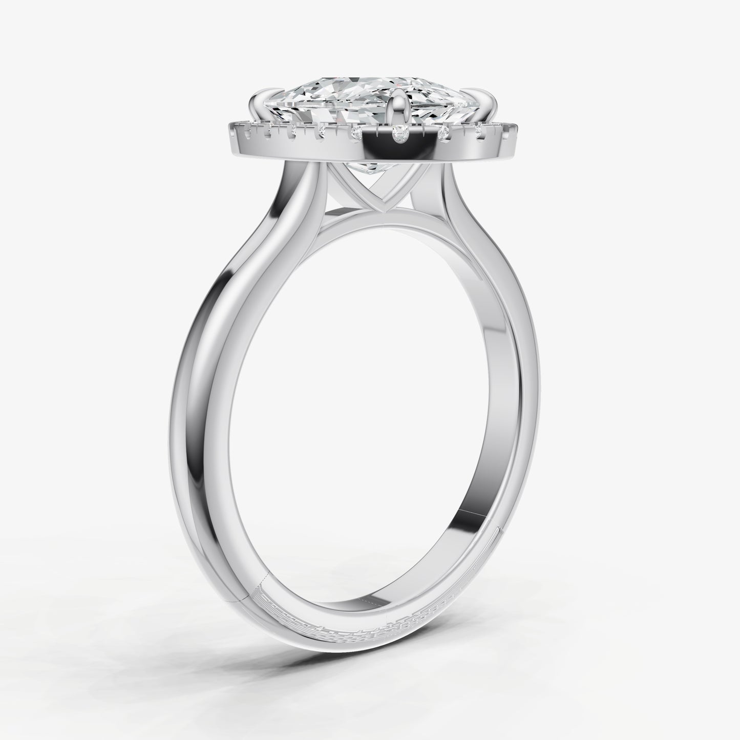 Elongated Cushion Solitaire Engagement Ring with Fine Halo Diamond Band