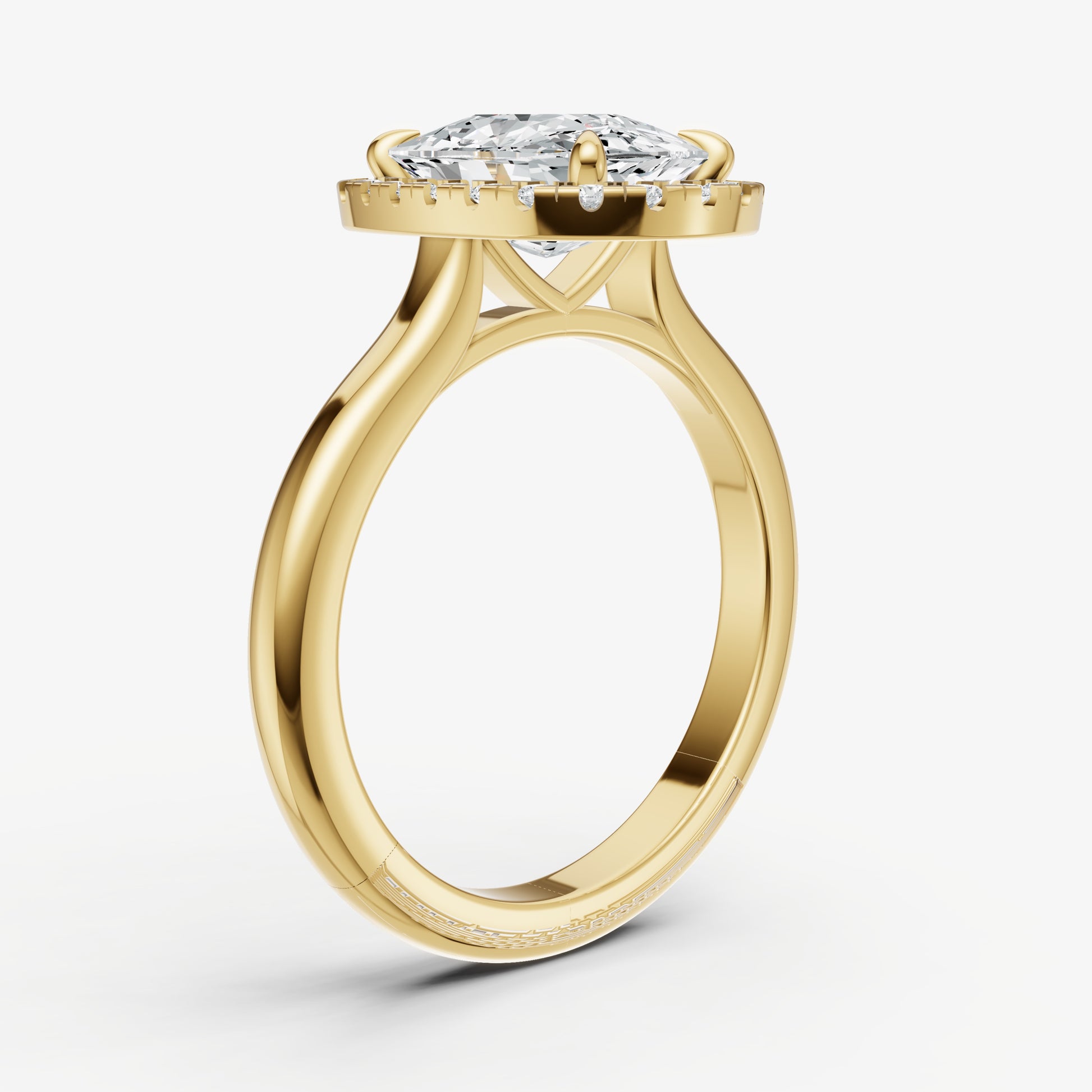 Elongated Cushion Solitaire Engagement Ring with Fine Halo Diamond Band