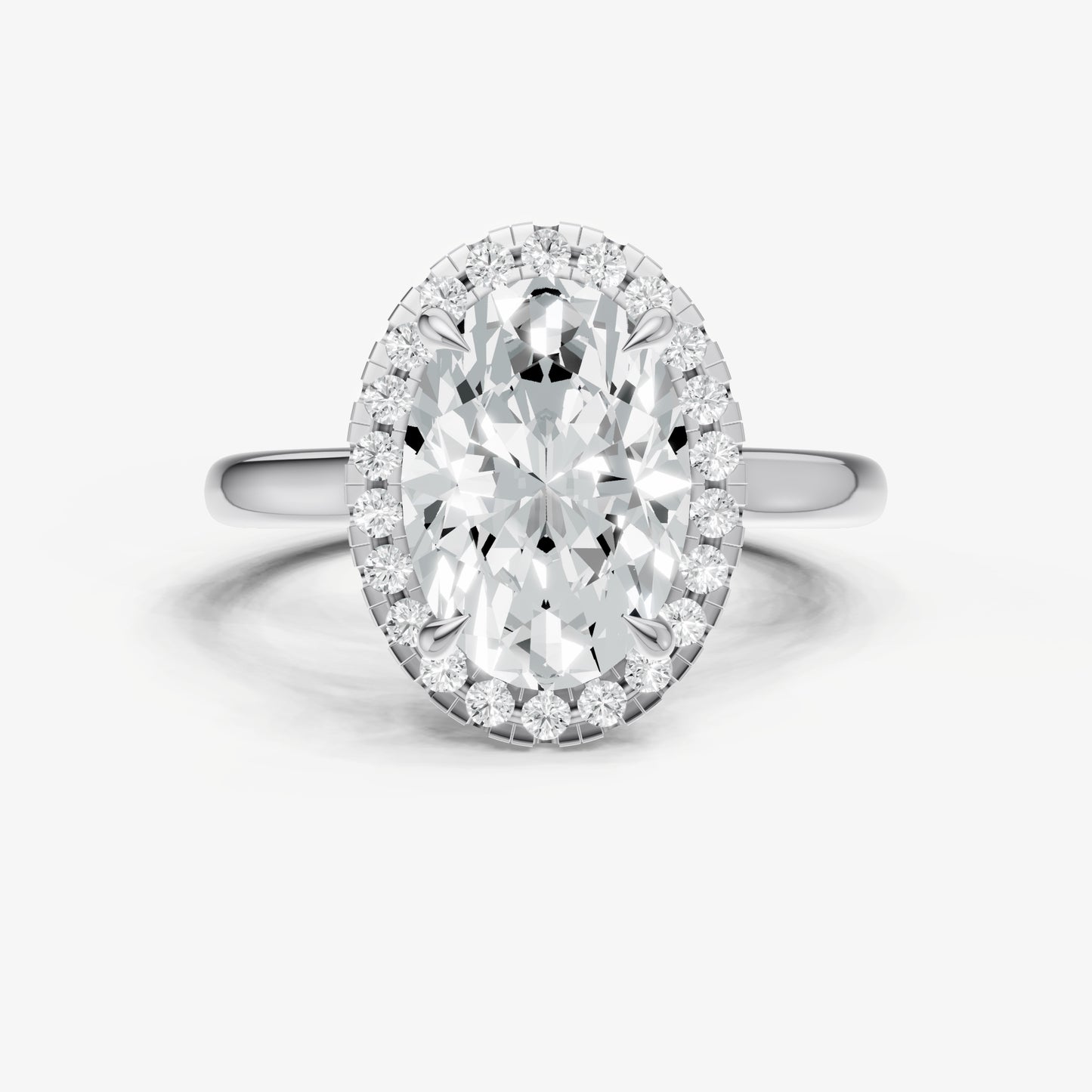 Oval Solitaire Engagement Ring with Fine Halo Diamond Band