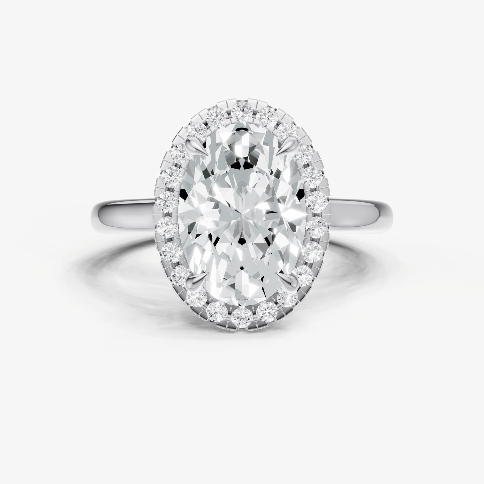 Oval Solitaire Engagement Ring with Fine Halo Diamond Band