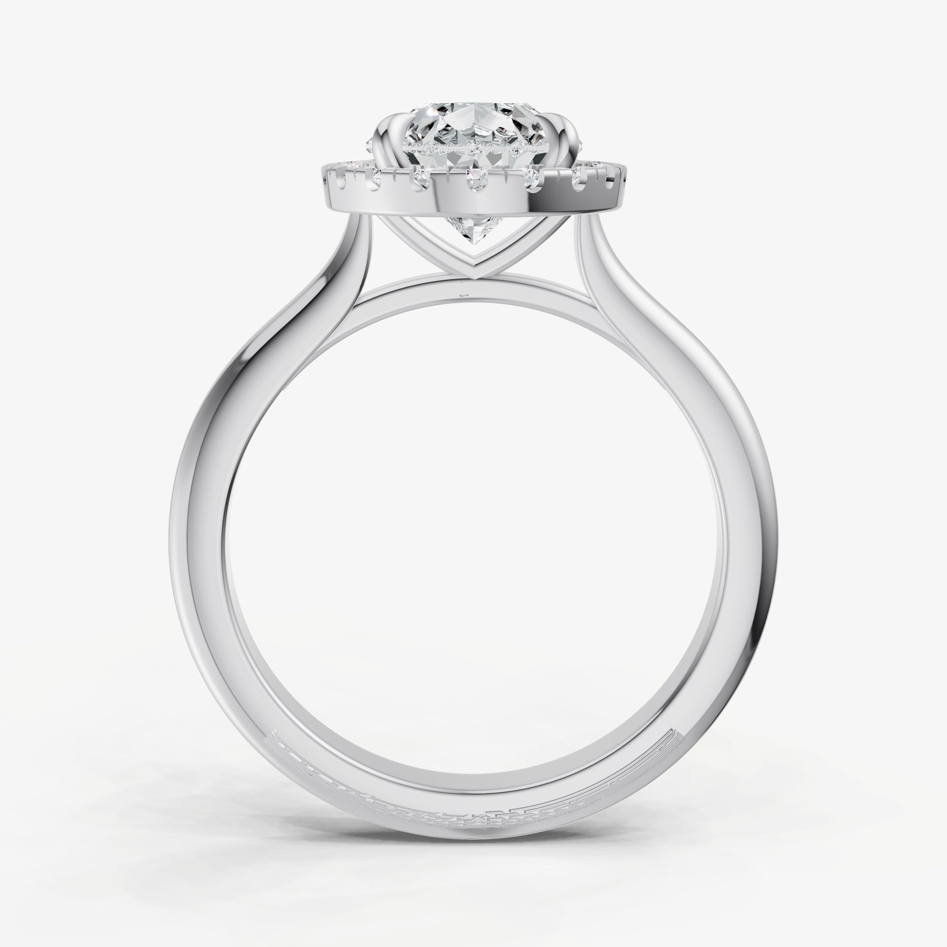 Pear Solitaire Engagement Ring with Fine Halo Diamond Band