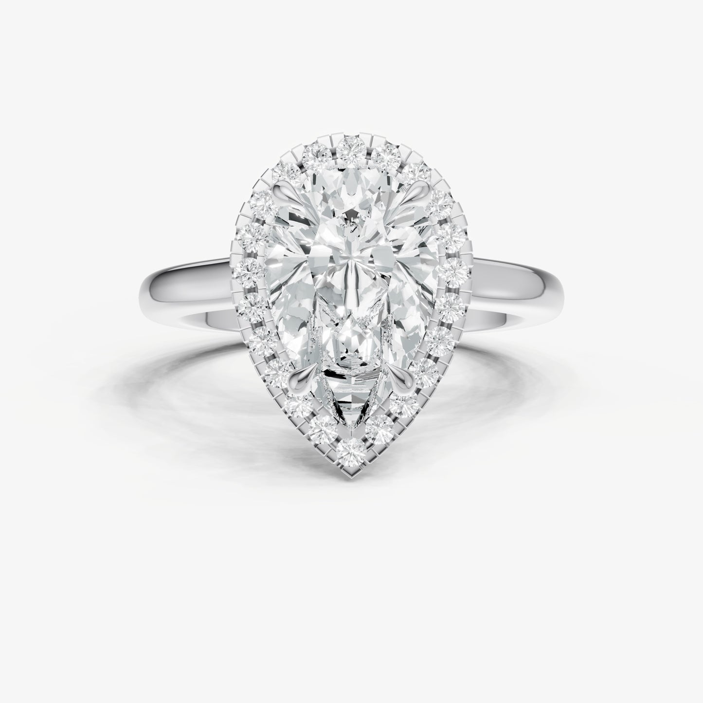 Pear Solitaire Engagement Ring with Fine Halo Diamond Band