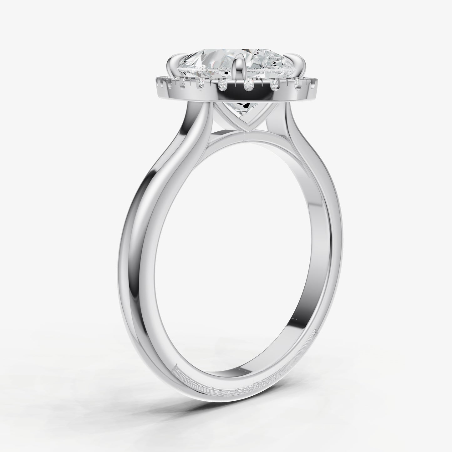 Pear Solitaire Engagement Ring with Fine Halo Diamond Band