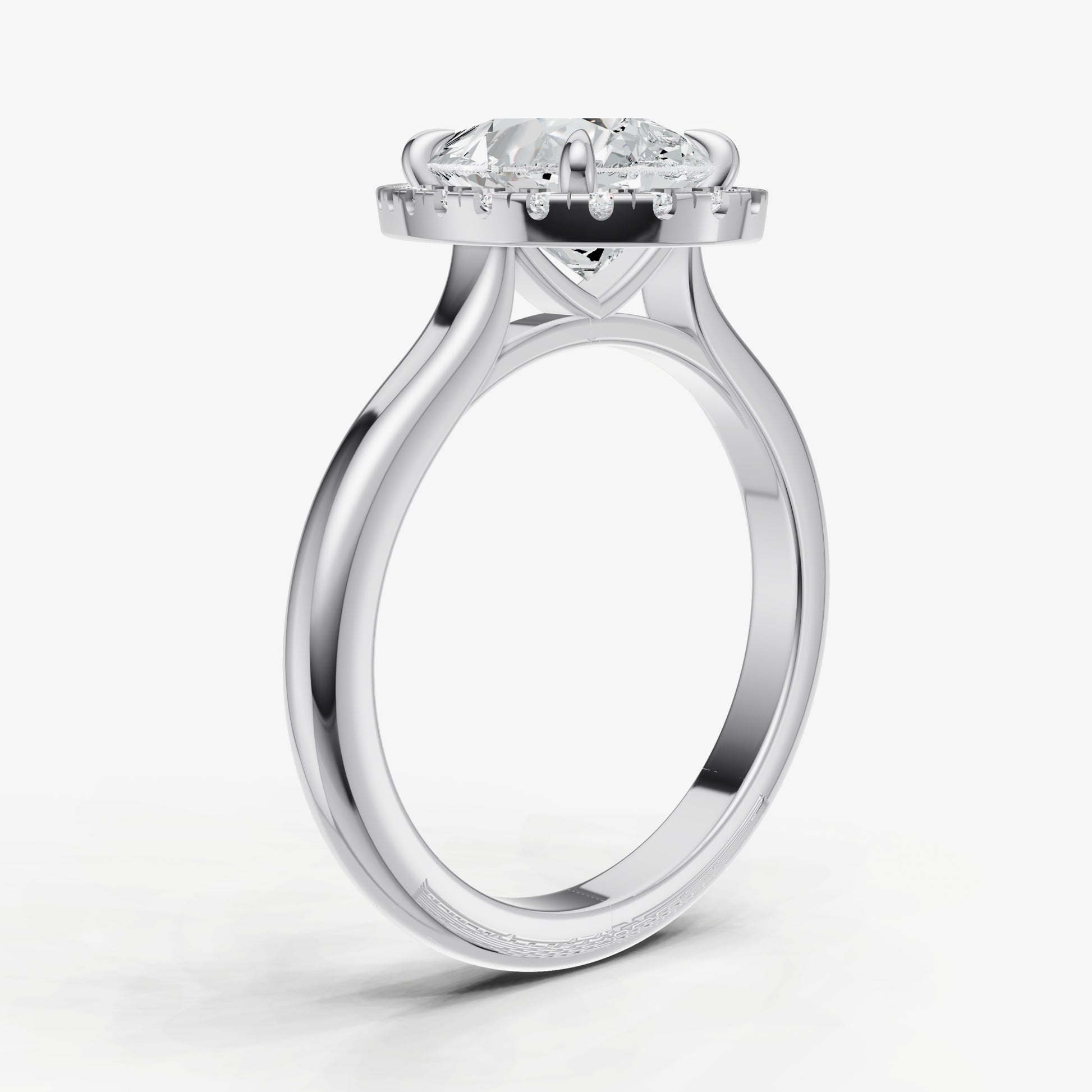 Pear Solitaire Engagement Ring with Fine Halo Diamond Band